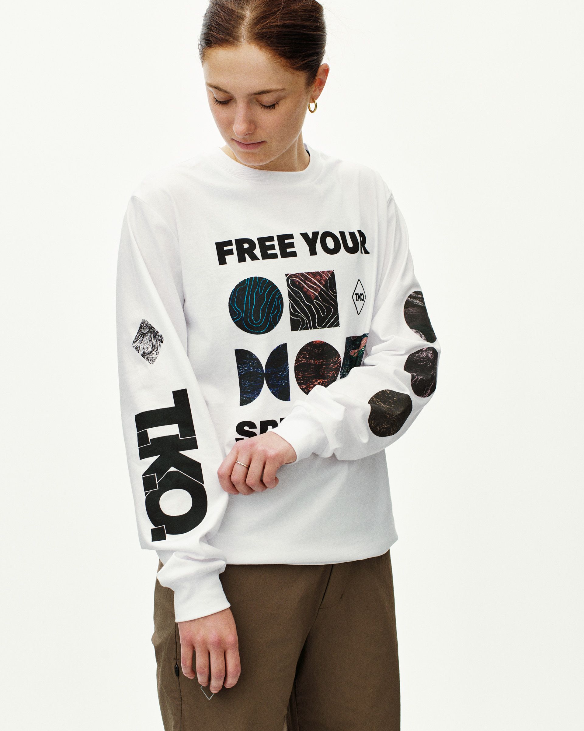 White T.K.O. Off-Race long sleeve T-shirt on model, front view with graphic chest and sleeve prints