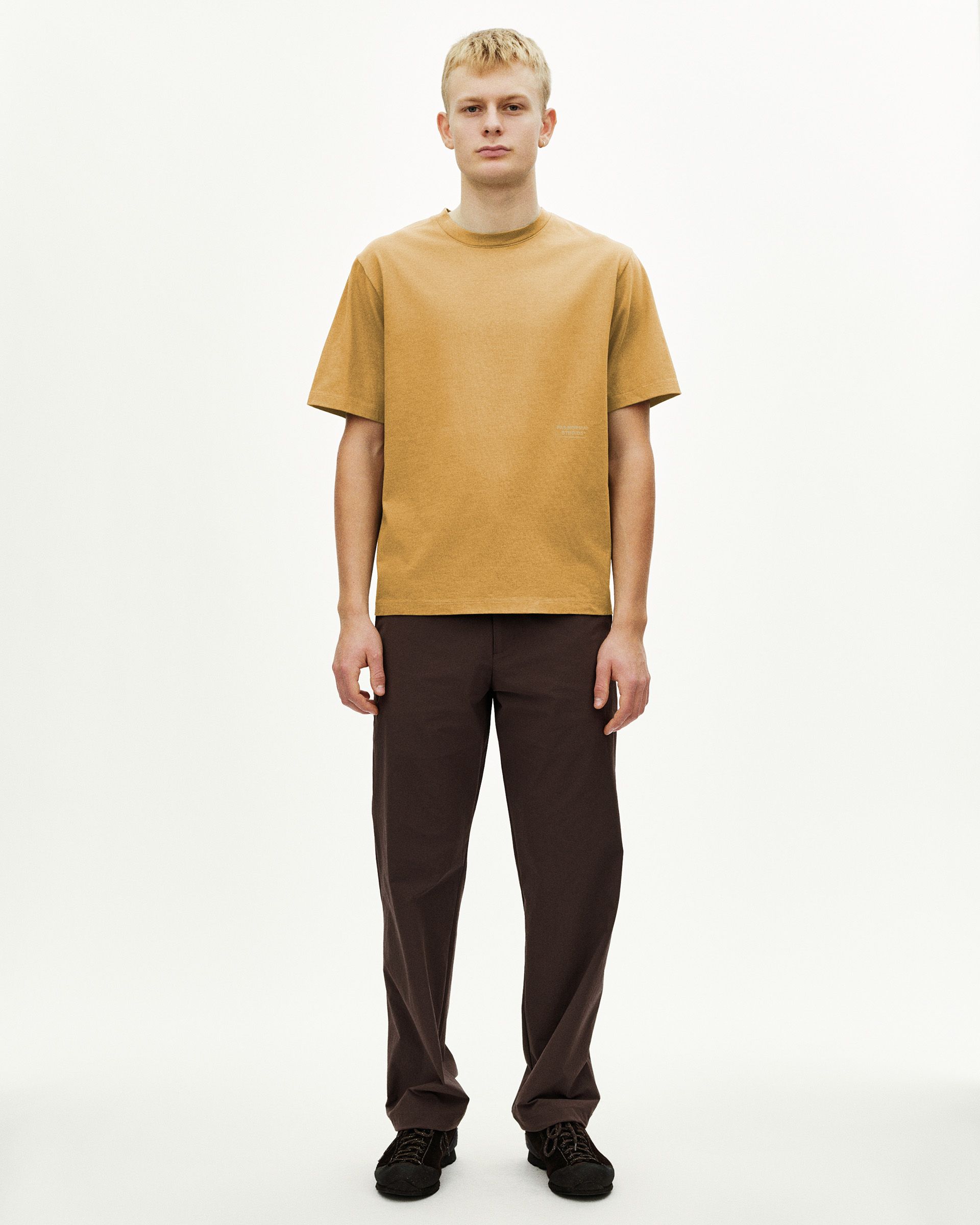 Sandstone Off-Race T-shirt on model, front view with tonal chest print