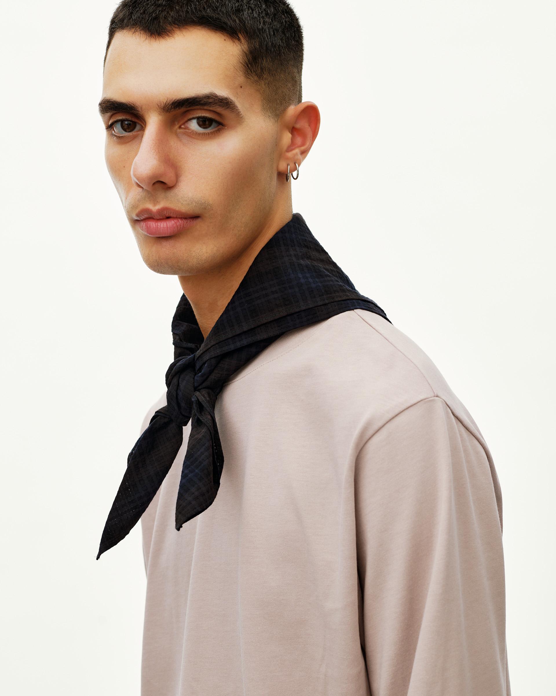 Dark Navy Off-Race Seersucker Bandana on model, tied at neck with check texture visible