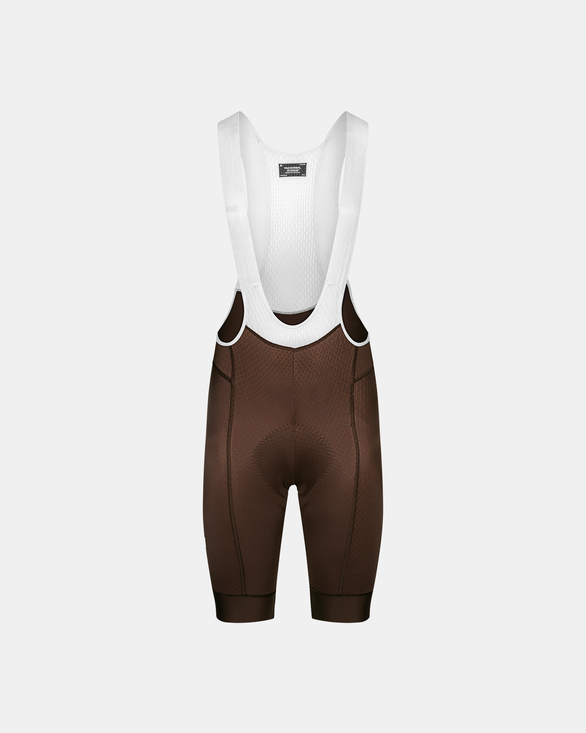 Light Brown Mechanism cycling bibs, front flat lay with white mesh straps