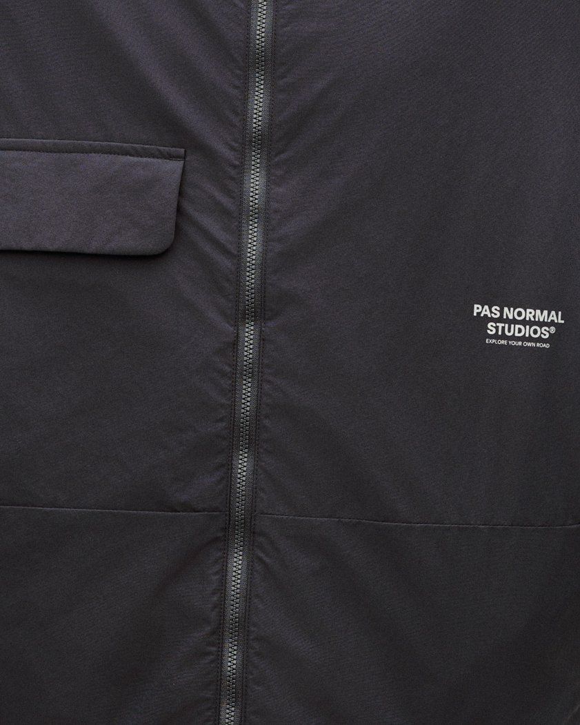 Dark Grey Off-Race Utility jacket, front detail view with full zip and chest pocket