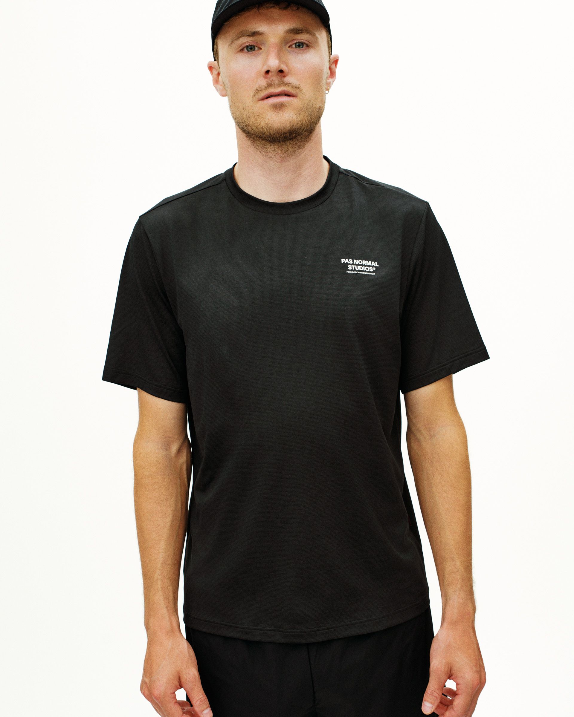 Black Balance t-shirt on model with white chest logo