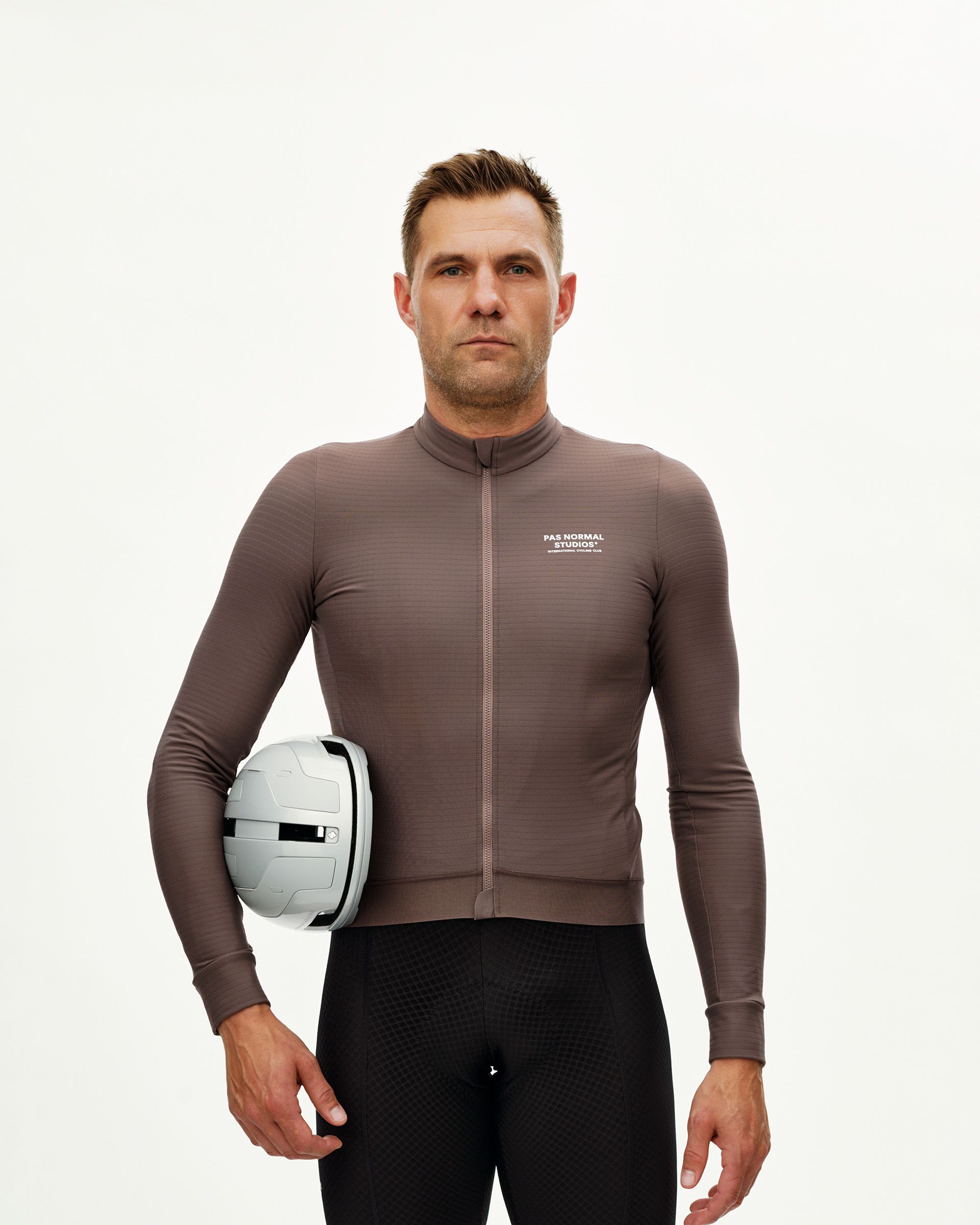 Dusty Plum Essential long sleeve cycling jersey on model, front view with chest logo print