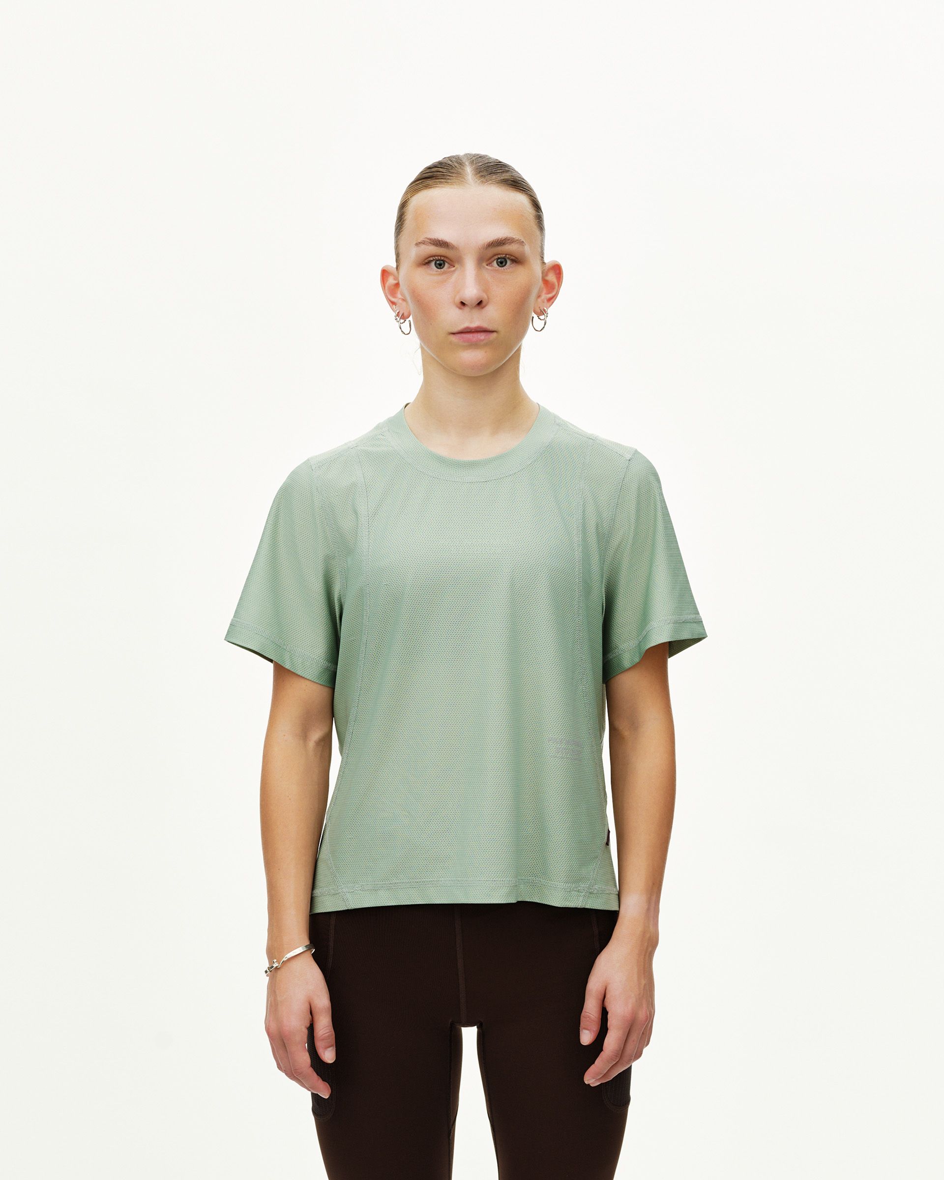 Green Sage Balance women's T-shirt, front view on model with textured mesh front panel