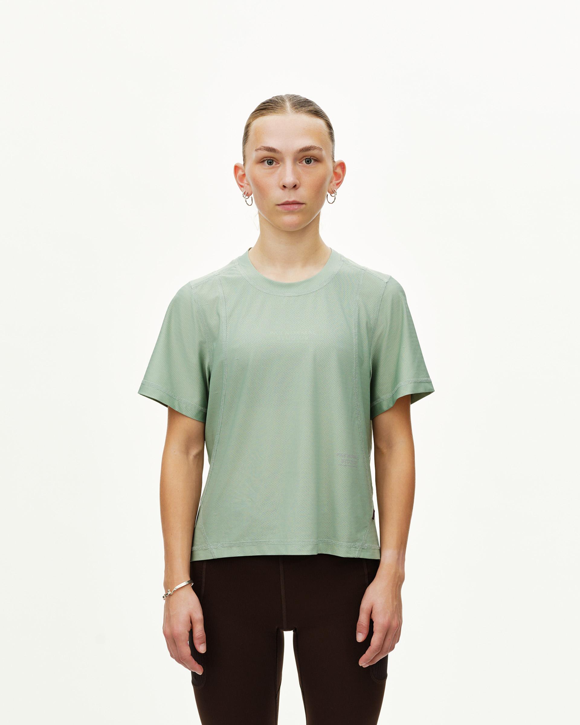 Green Sage Balance women's T-shirt, front view on model with textured mesh front panel