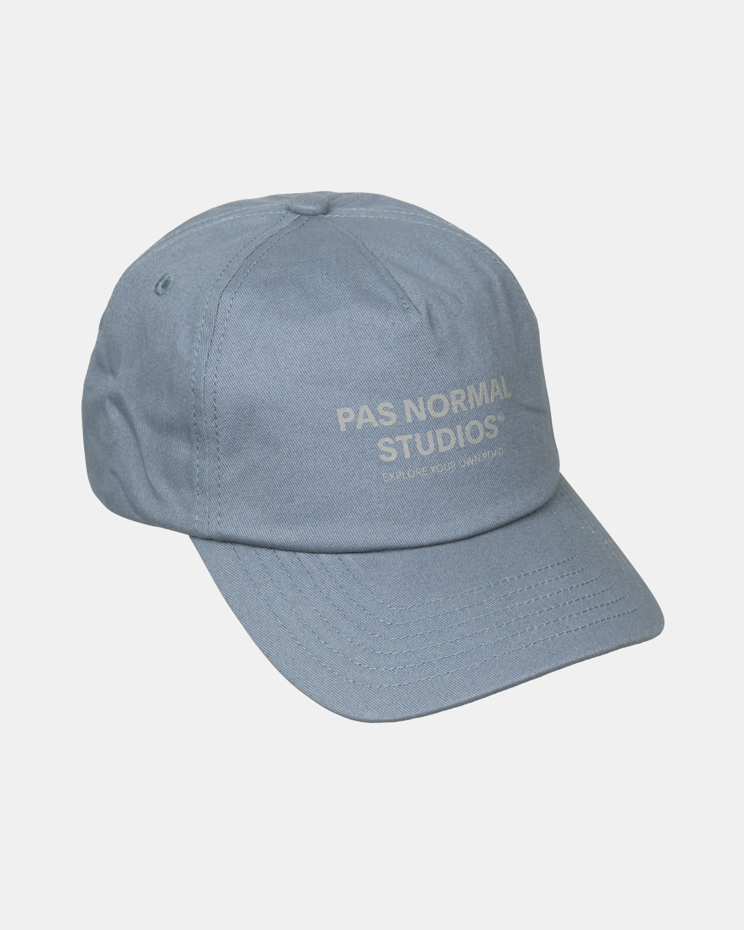 Light Blue Off-Race Cotton cap, three-quarter view with embroidered text logo