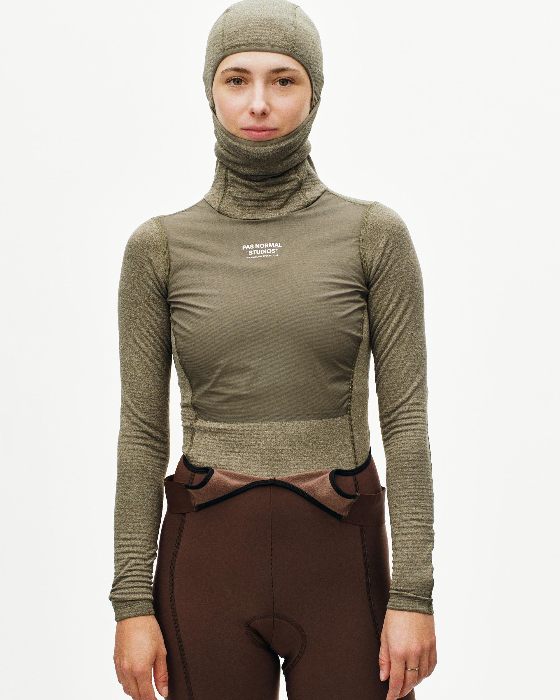 Grey Thermal Hooded Windproof base layer on model with white chest logo and textured sleeves