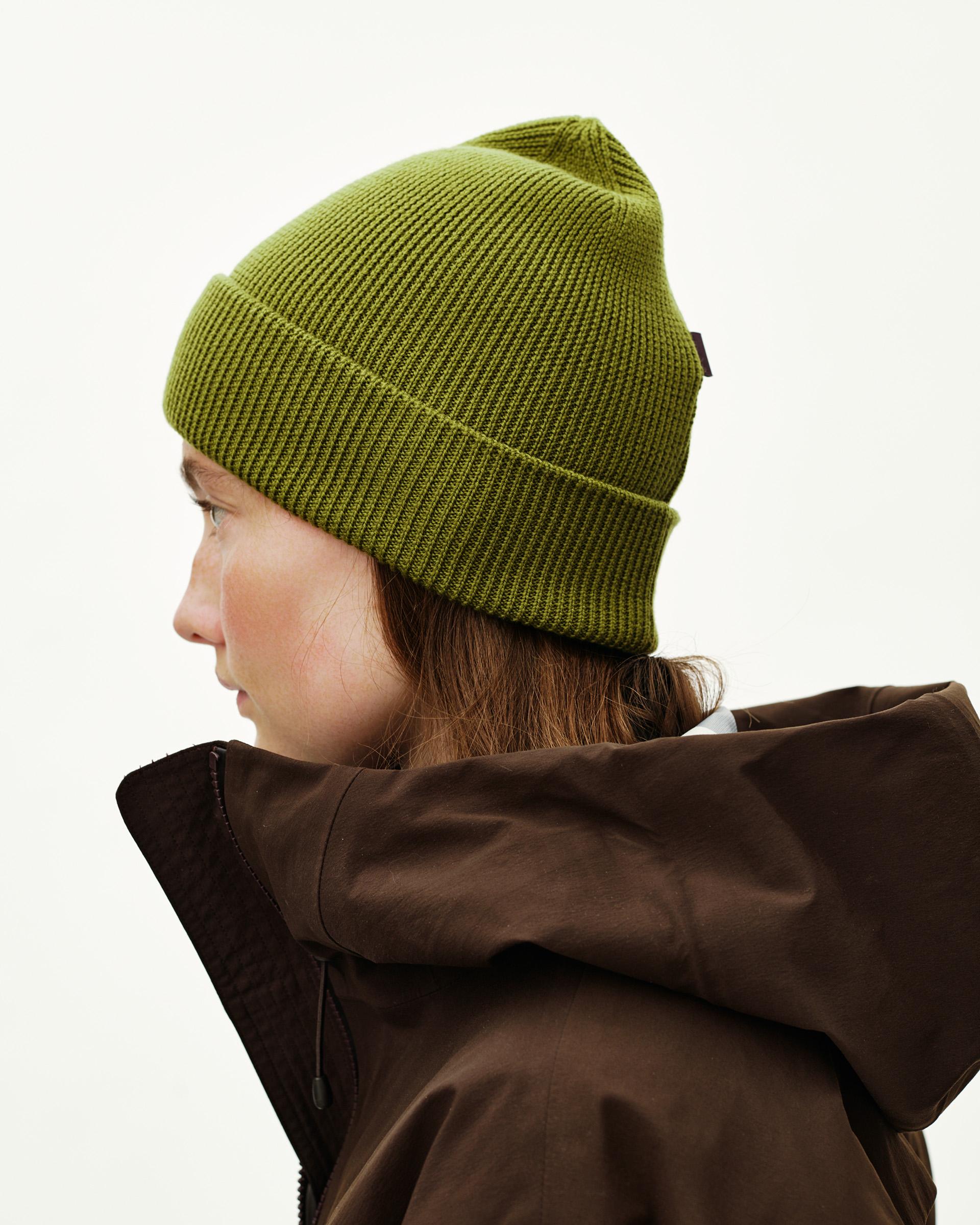 Dark Lime green Off-Race Wool Knit beanie on model, side view with ribbed cuff
