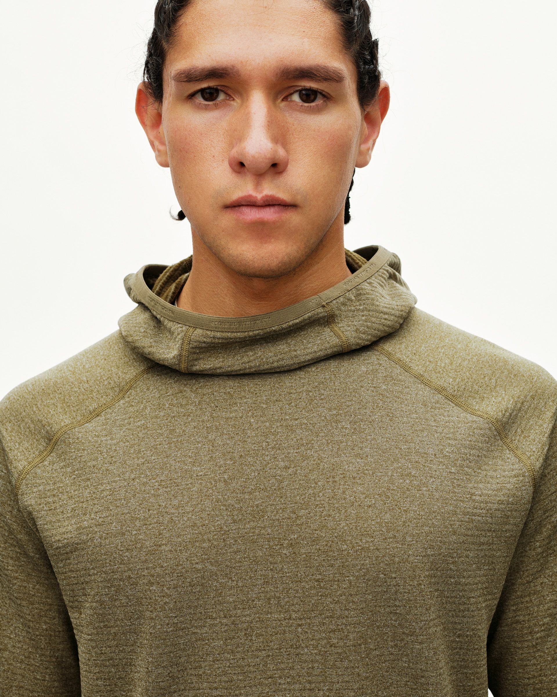Moss Brown Balance Thermal Hoodie on model, front detail view with draped hood