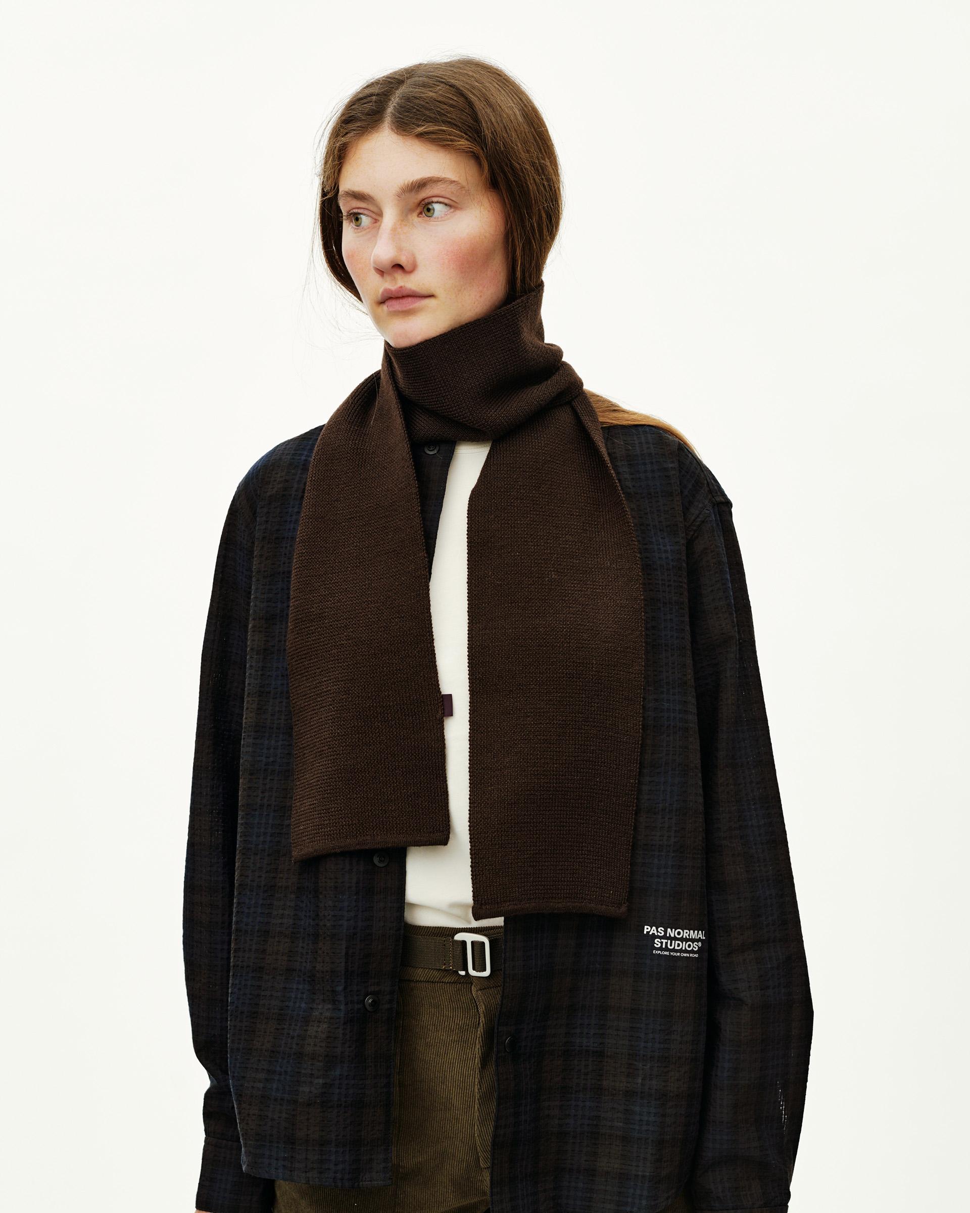 Light Brown Off-Race Wool Knit scarf on model, front view with small woven label tab