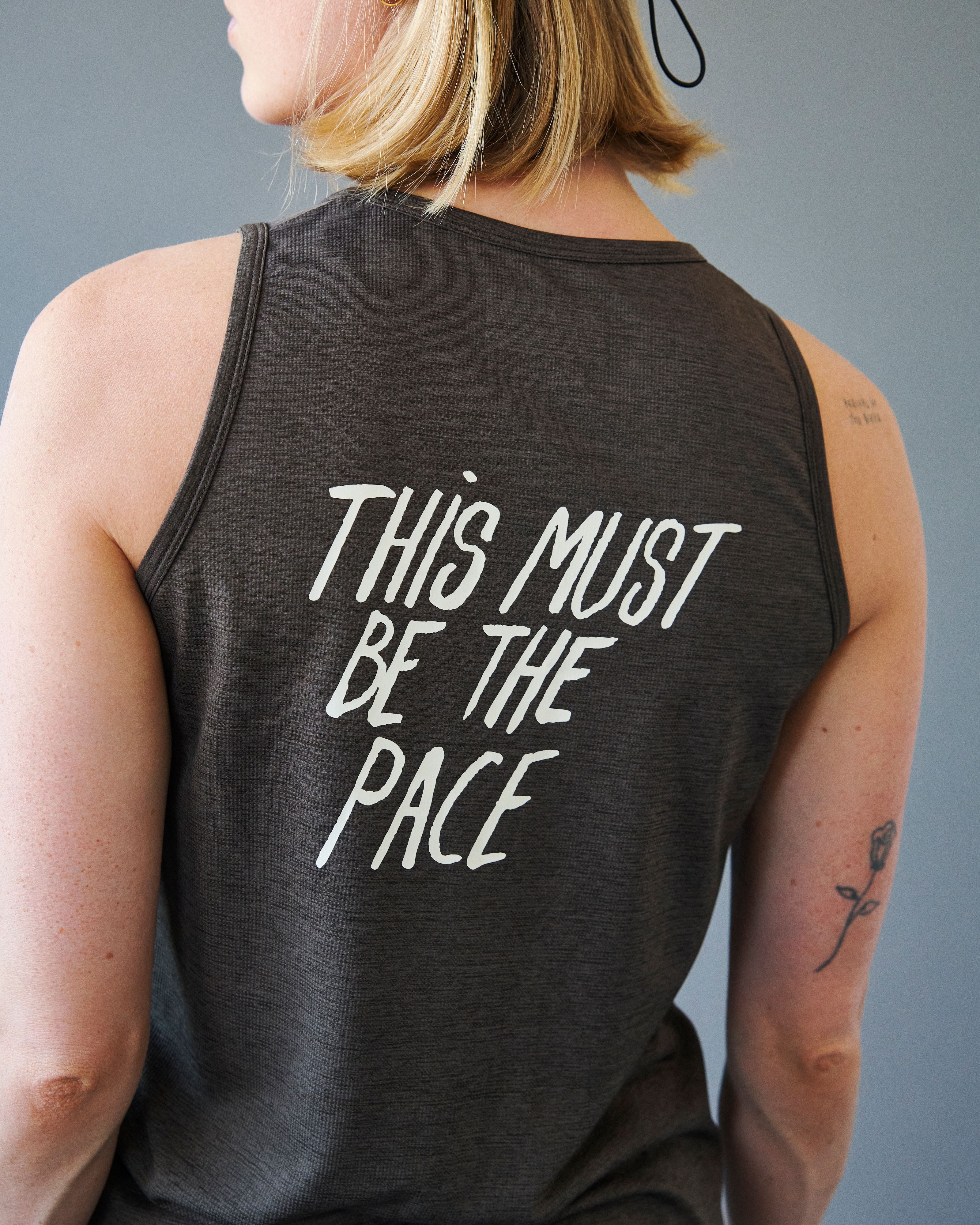 Purple Balance singlet, rear view on model with white back print
