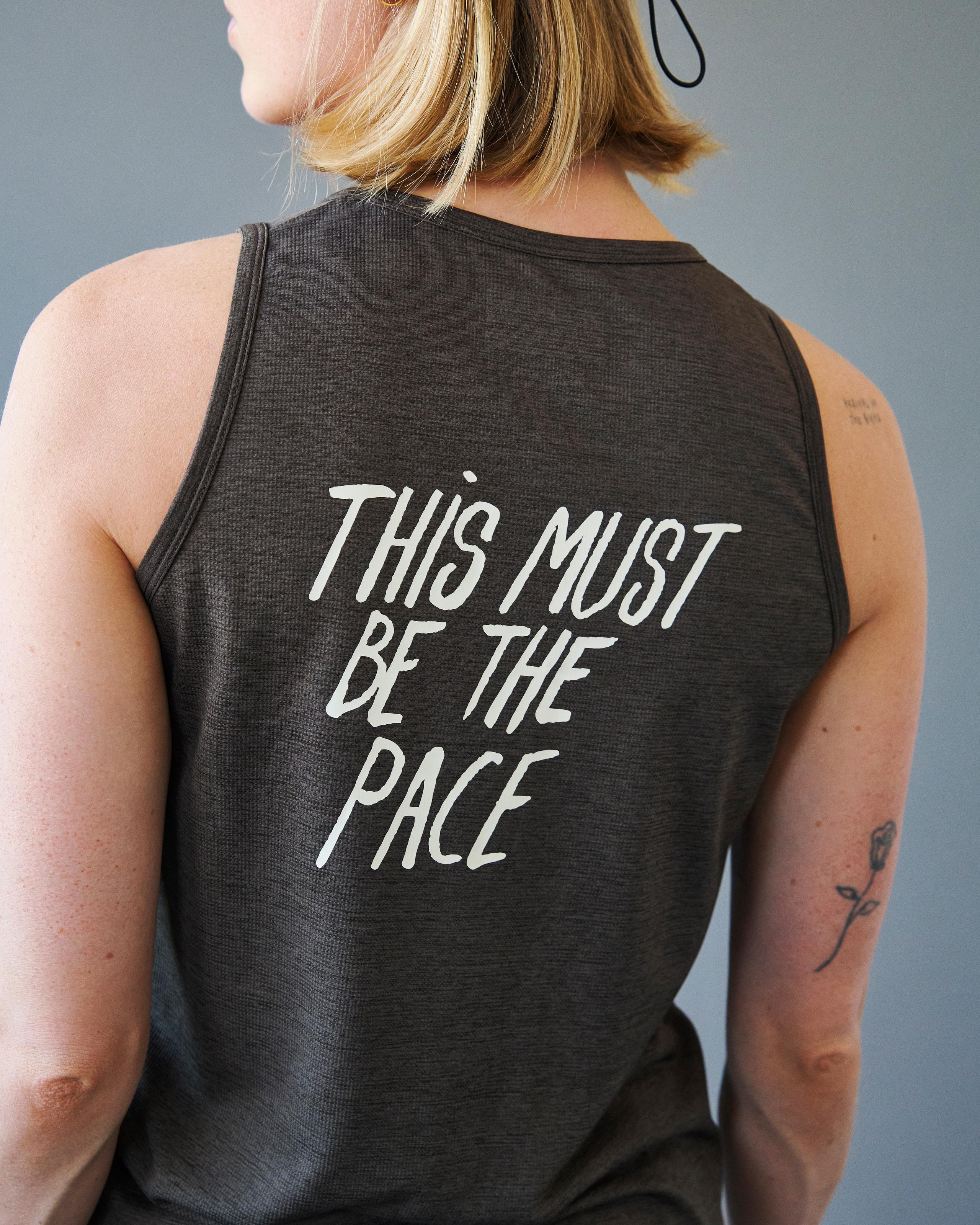 Purple Balance singlet, rear view on model with white back print