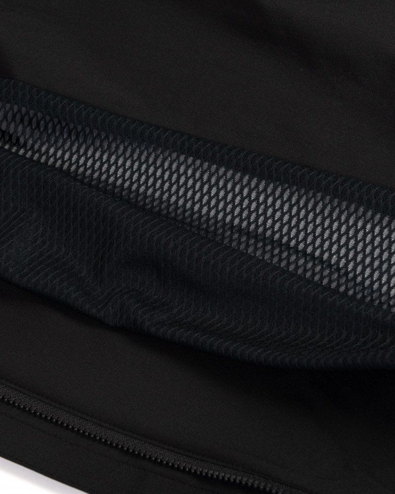 Navy Mechanism Stow Away gilet, detail view with mesh ventilation panel and flatlock seams