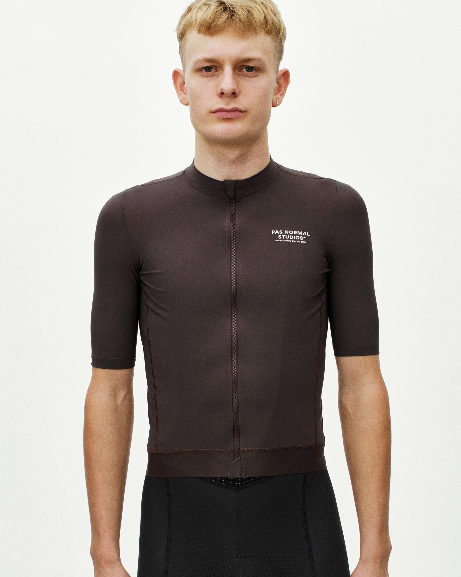Dark Purple Essential cycling jersey on model with full zip and white chest logo