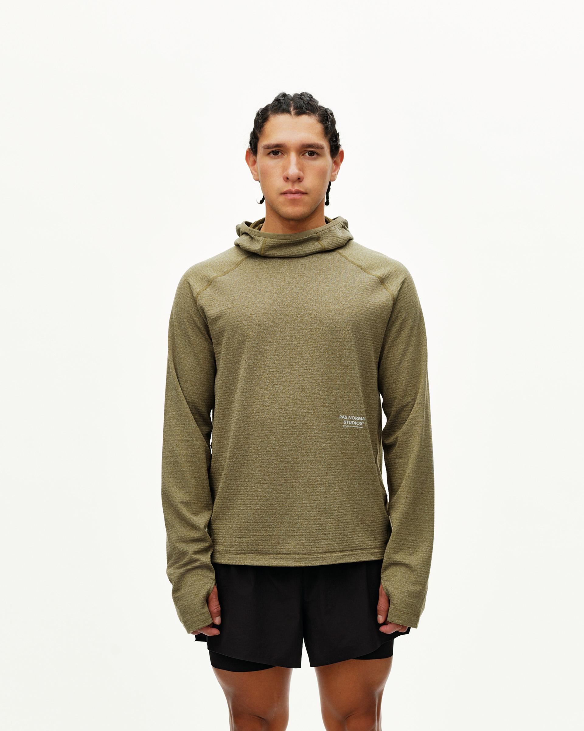 Moss Brown Balance Thermal hoodie on model, front view with ribbed texture and small chest logo