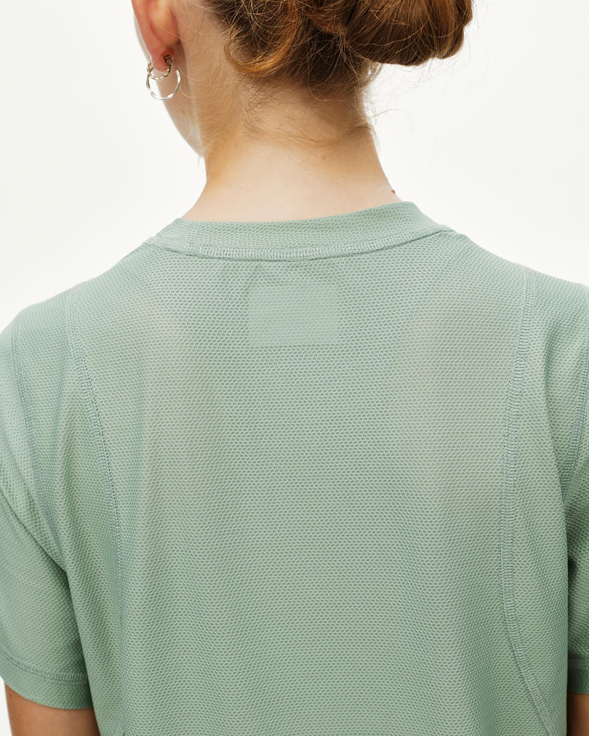 Green Sage Balance women's T-shirt, rear view on model with textured mesh fabric