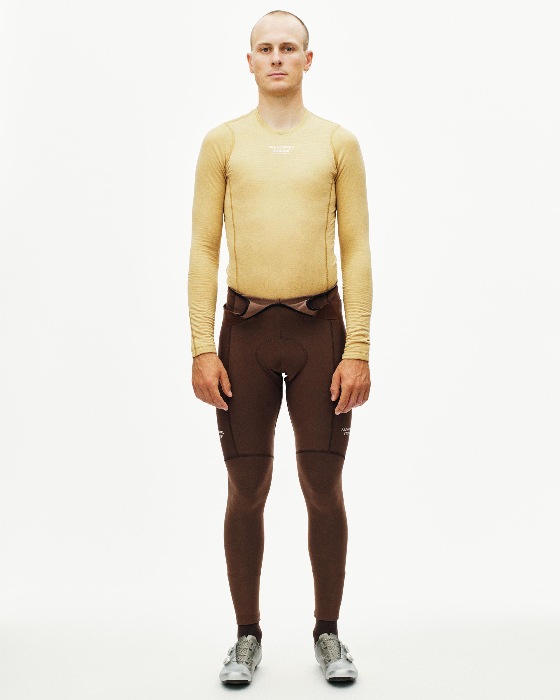 Camel thermal long sleeve base layer on model, front view with white chest logo
