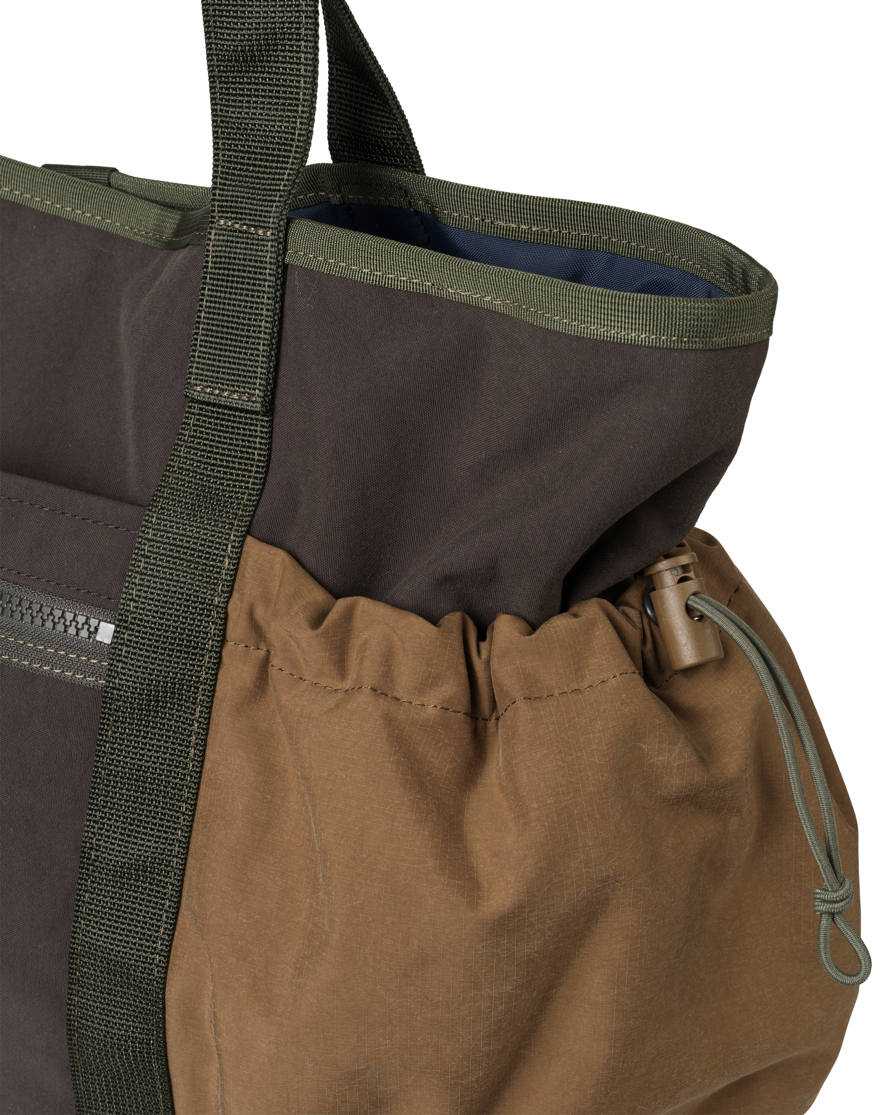 Light Brown Porter-Yoshida tote bag, detail view of drawstring pocket with olive webbing straps and blue interior lining