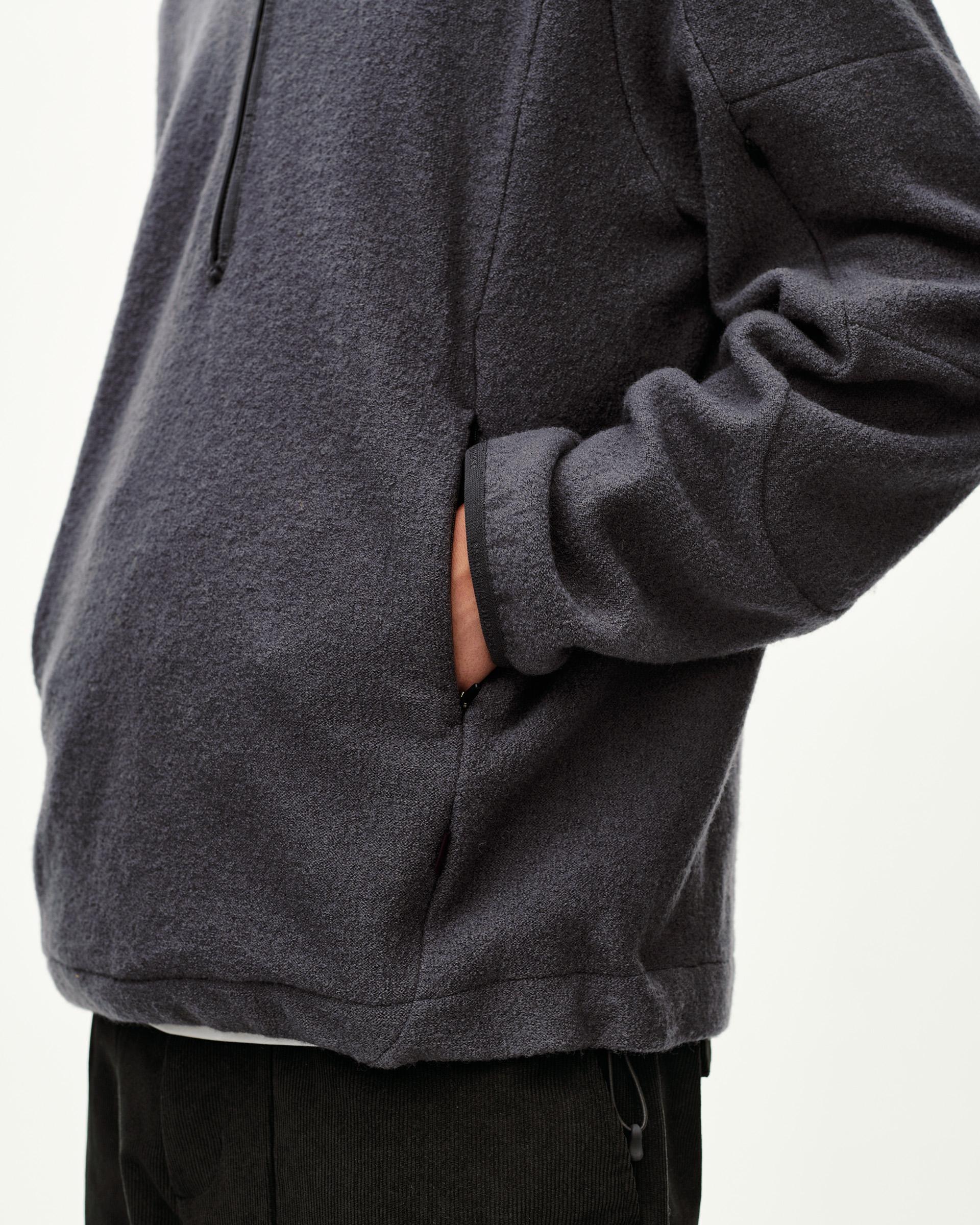 Steel grey Off-Race Boiled Wool Half-Zip outerwear, side detail on model showing slash pocket