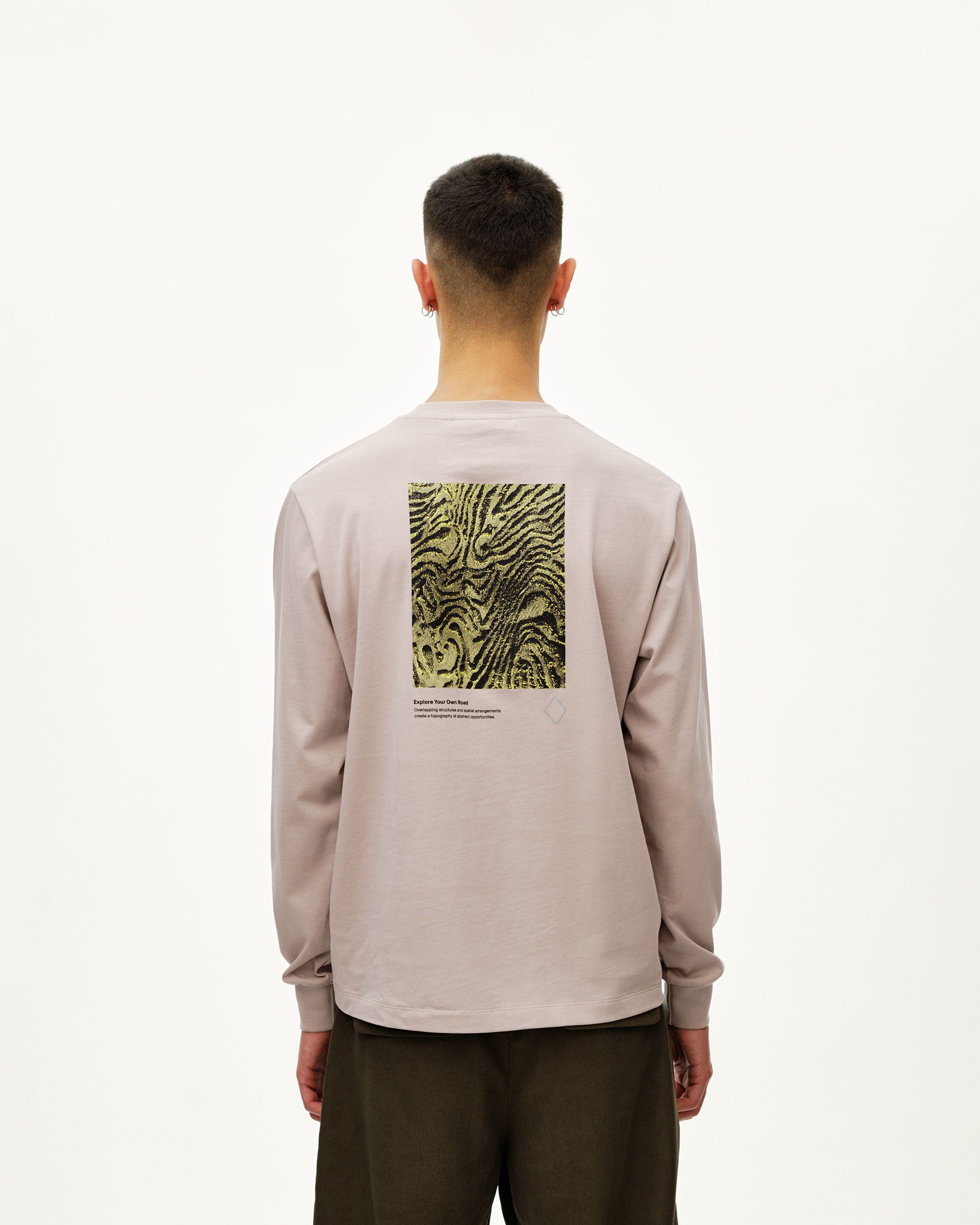 Haze purple Off-Race long sleeve graphic T-shirt on model, rear view with abstract topographic back print