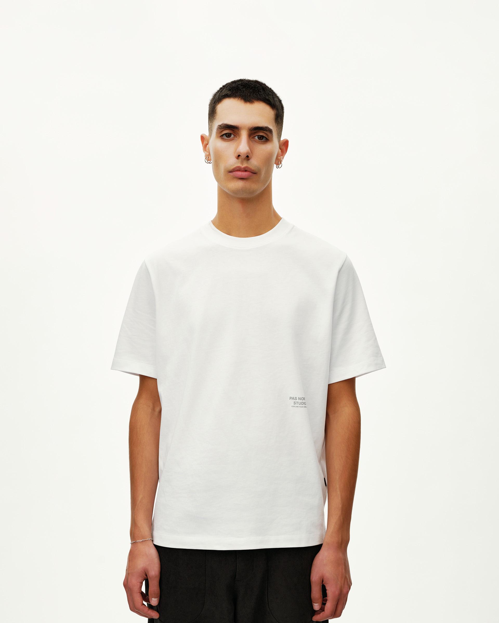White Off-Race Graphic T-shirt on model, front view with small text print at lower chest