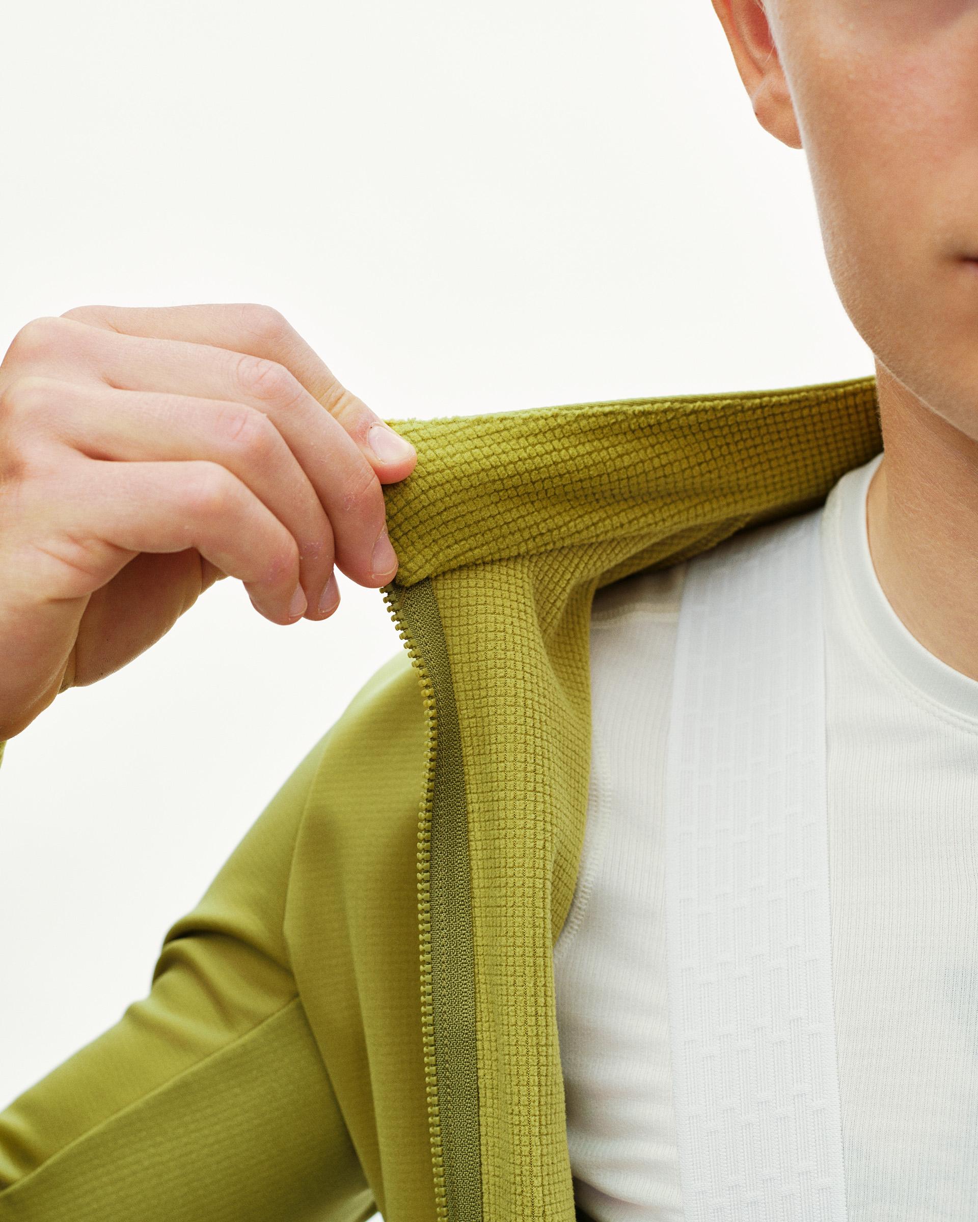Dark Lime green PAS Mechanism Thermal Long Sleeve cycling jersey, neck detail on model showing ribbed collar and full zip
