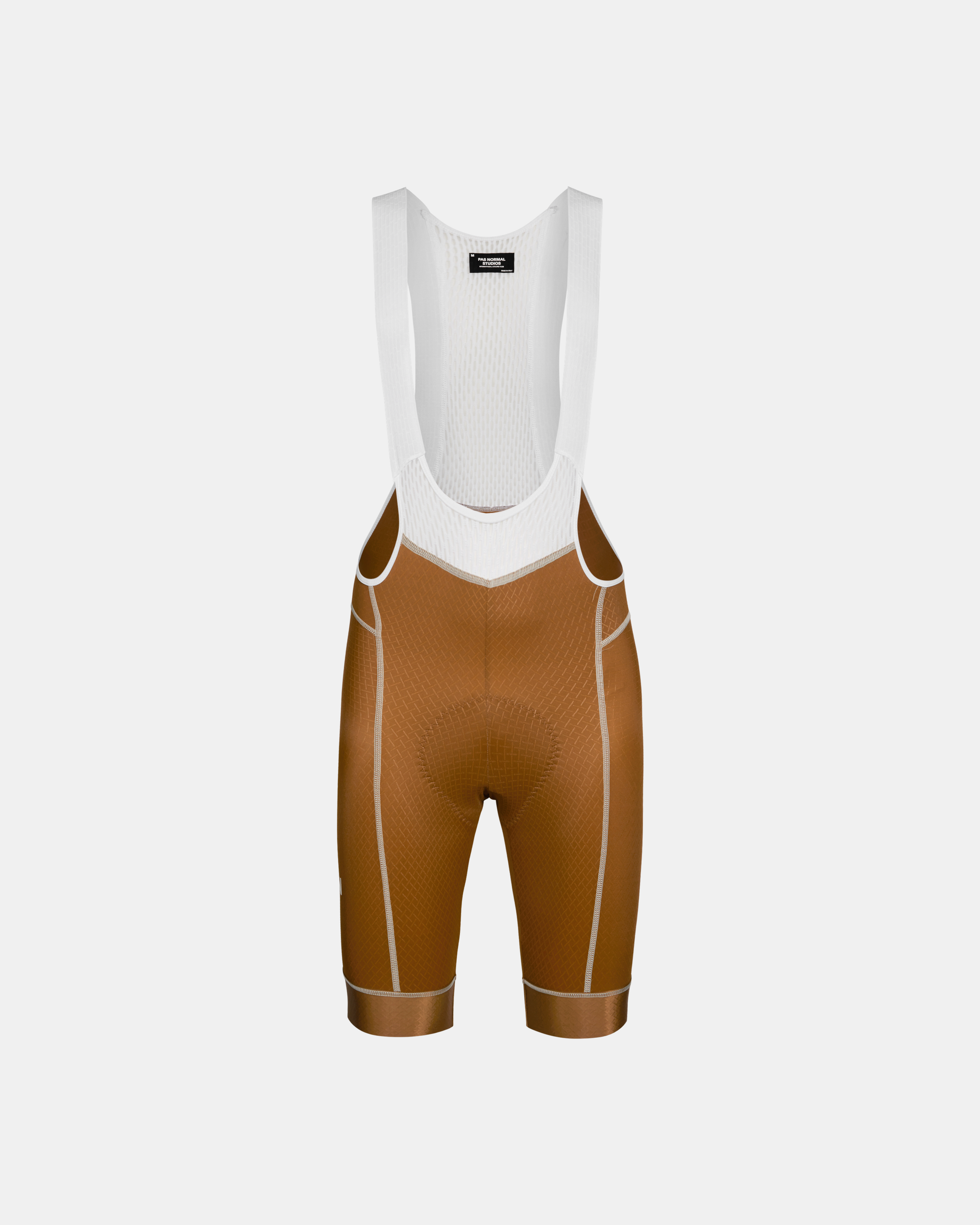 Brown Mechanism cycling bibs, front flat lay with white contrast stitching