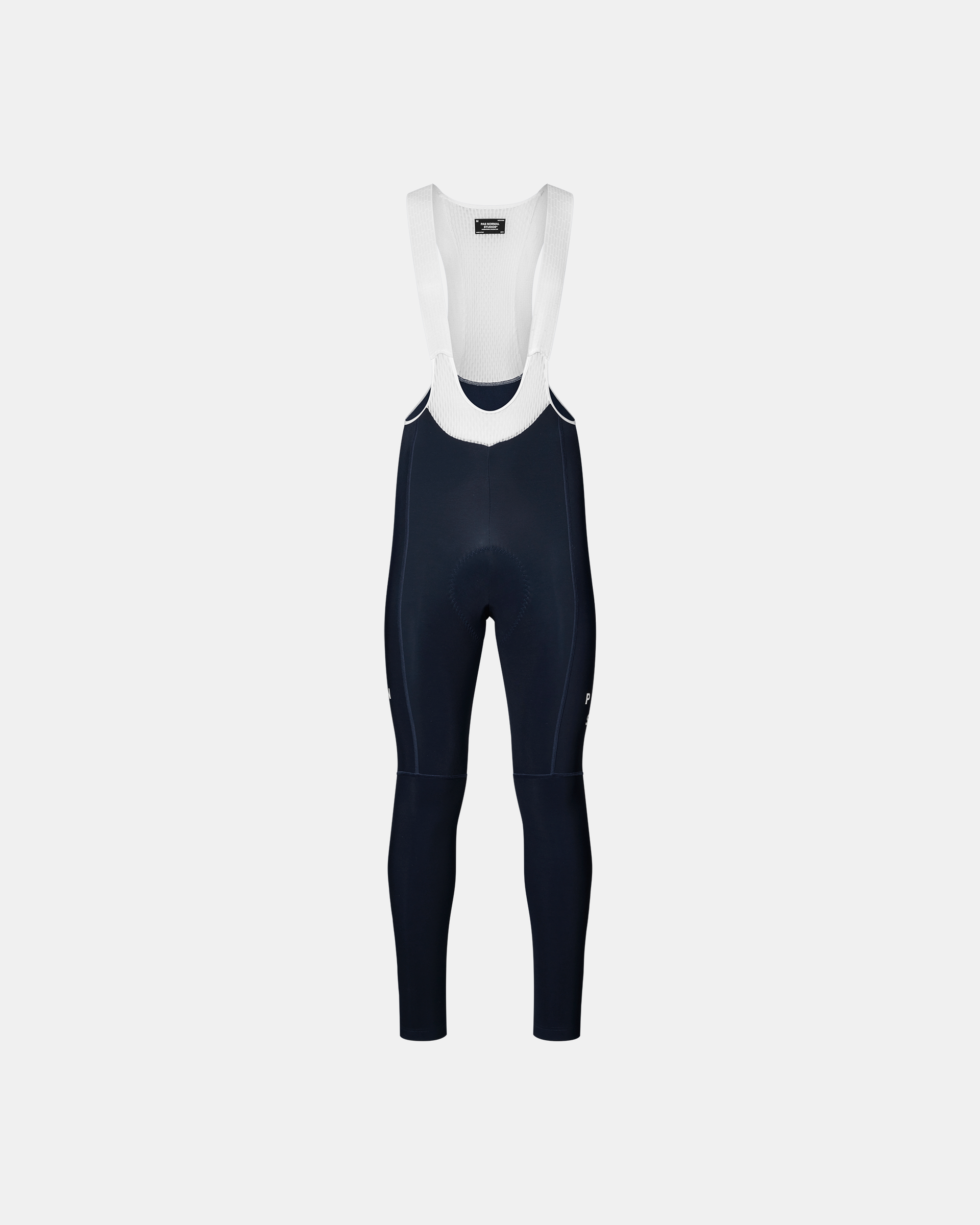 Navy Mechanism cycling bib tights, front flat lay with white mesh bib straps