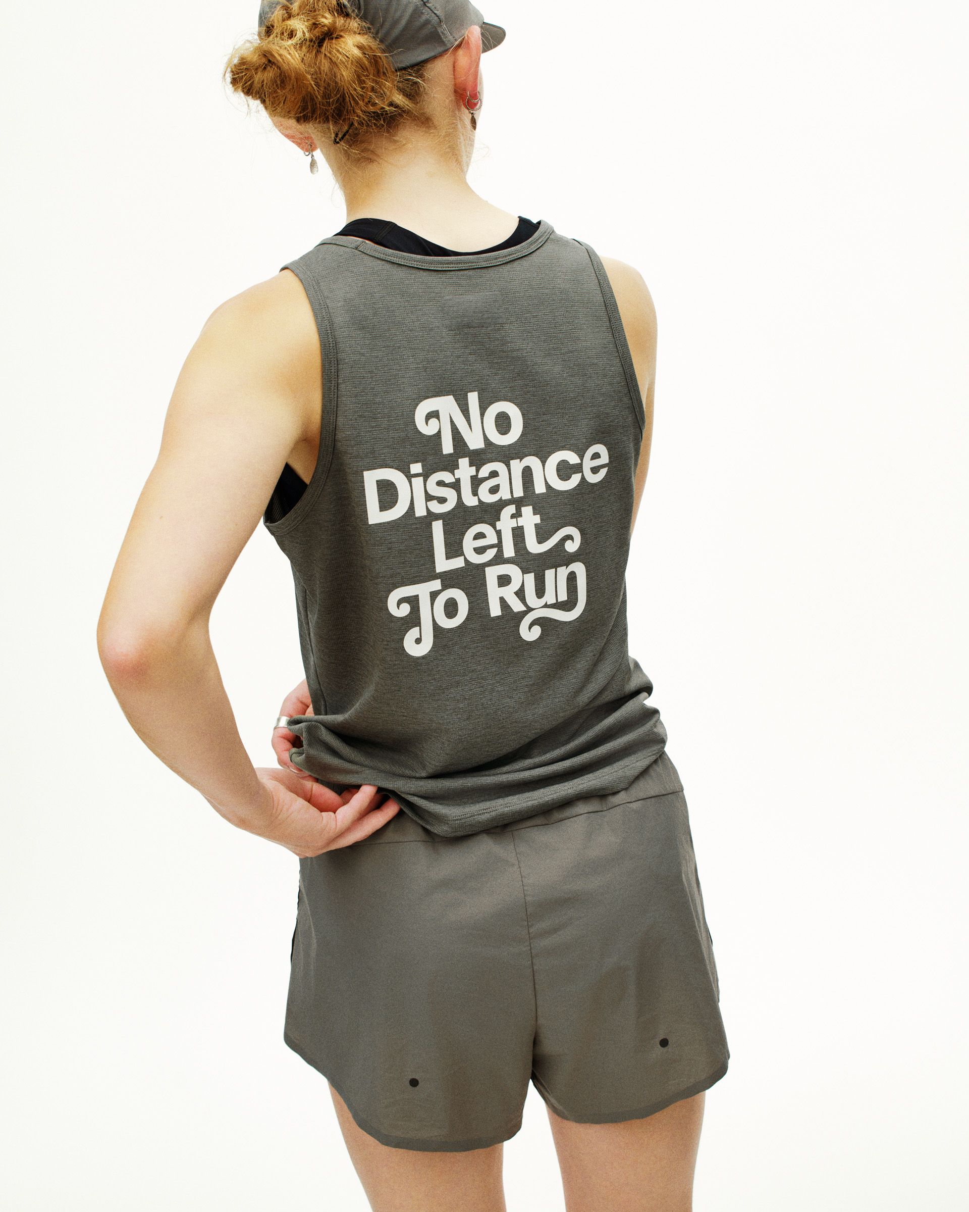 Grey Balance singlet on model, rear view with white No Distance Left To Run print