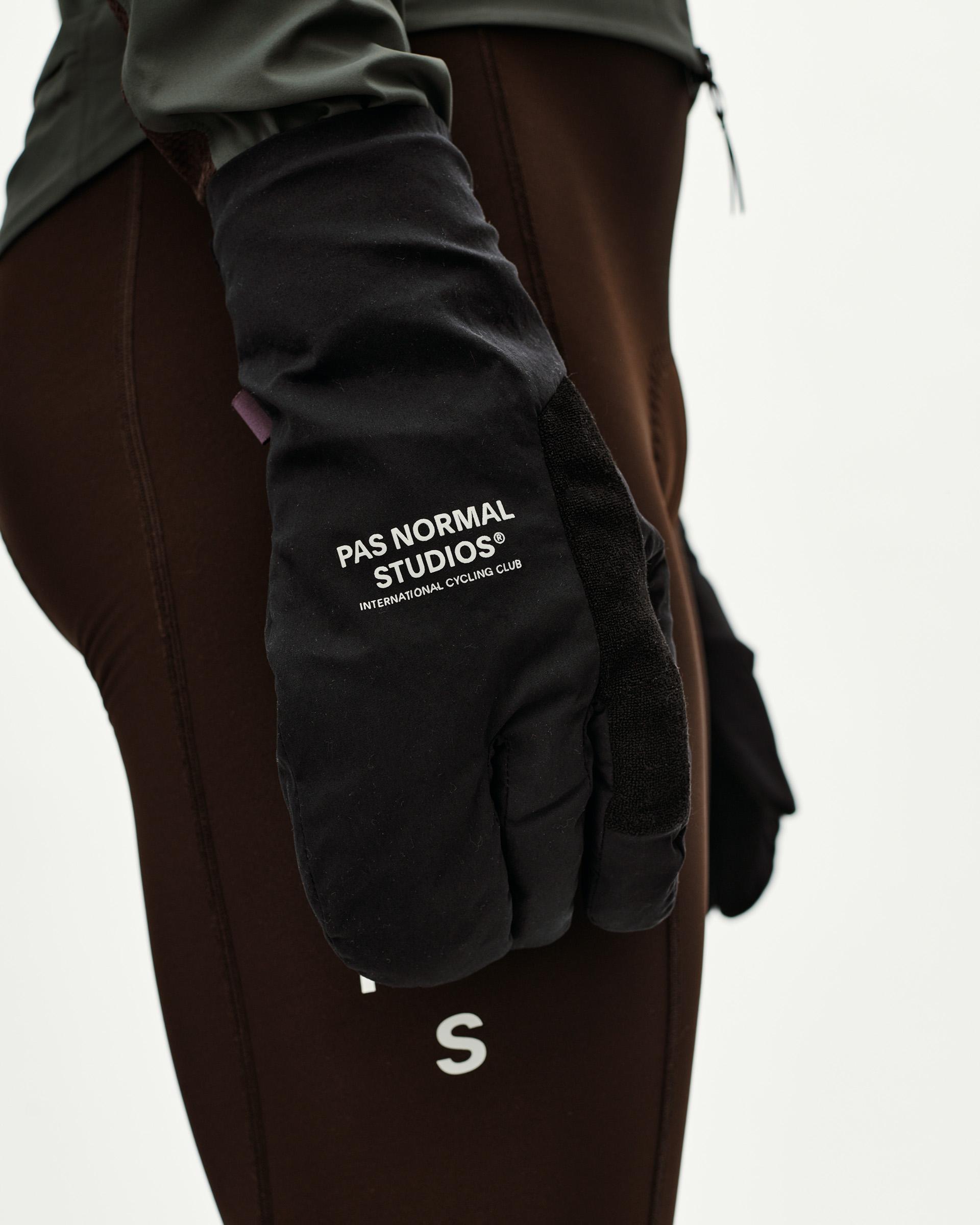 Black Logo Deep Winter Insulated cycling gloves on model, side detail view with white chest print