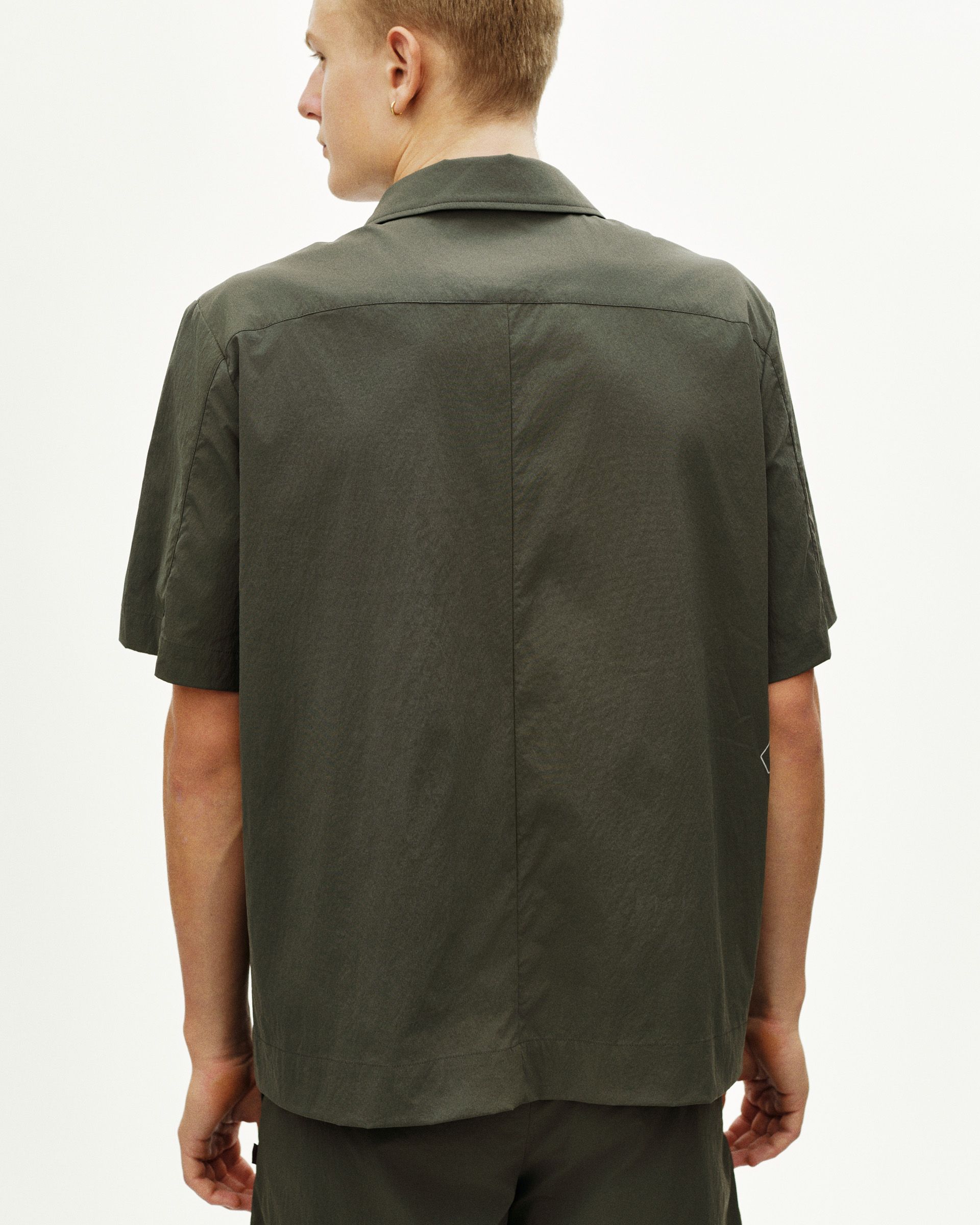 Dark Grey Off-Race Light Tech shirt, rear view on model with center back seam