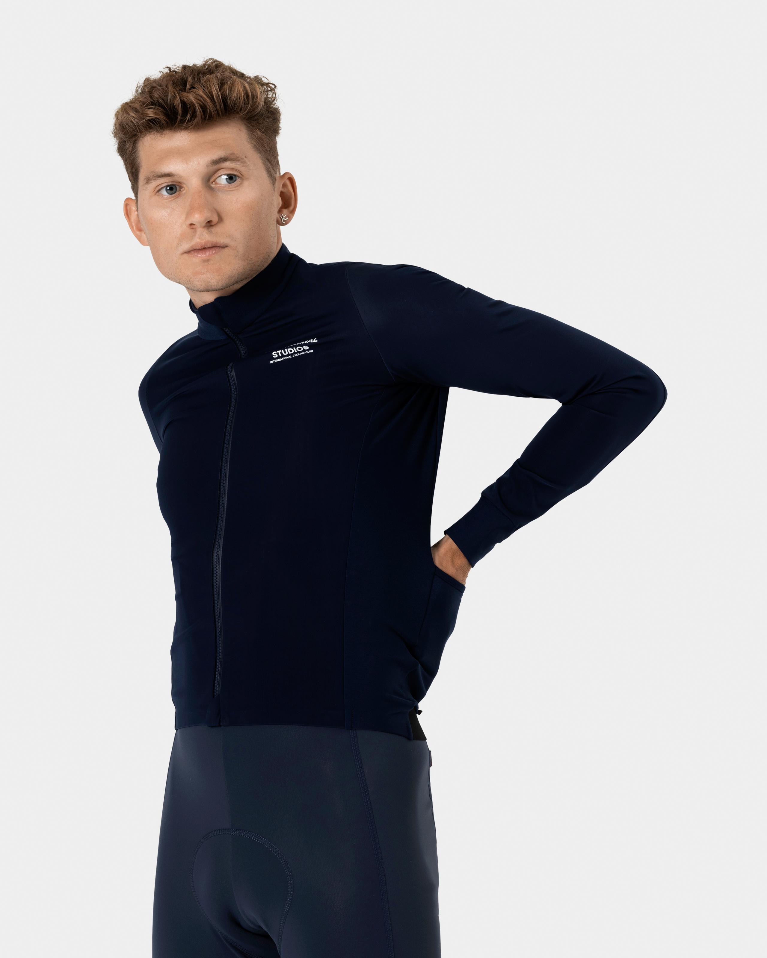 Navy Mechanism Thermal long sleeve cycling jersey on model with front zip