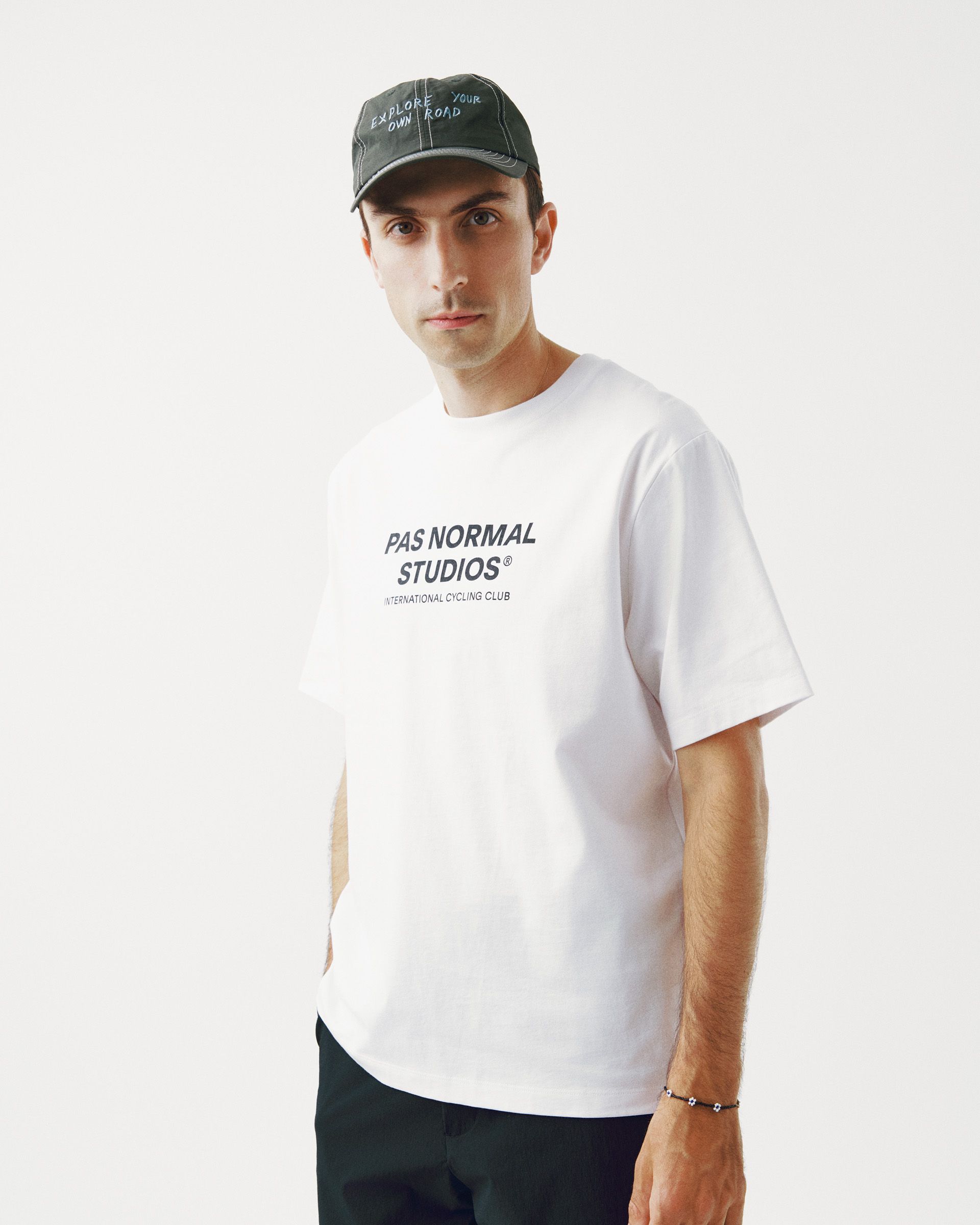 White Off-Race Logo T-shirt on model, three-quarter front view with brand chest print
