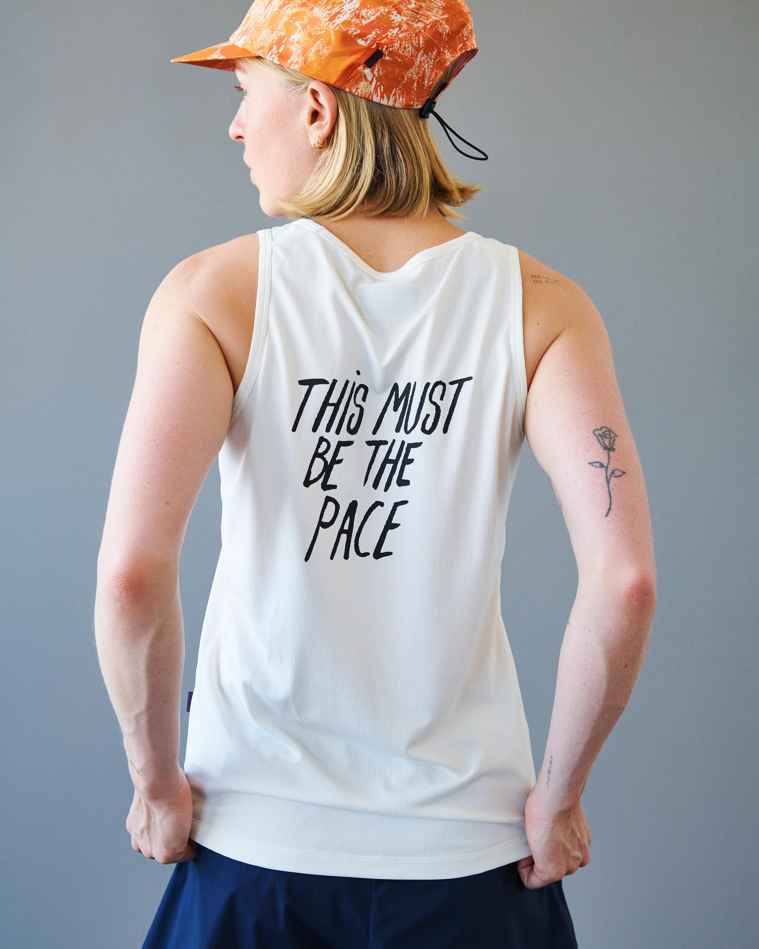 White Balance singlet on model, rear view with black text print