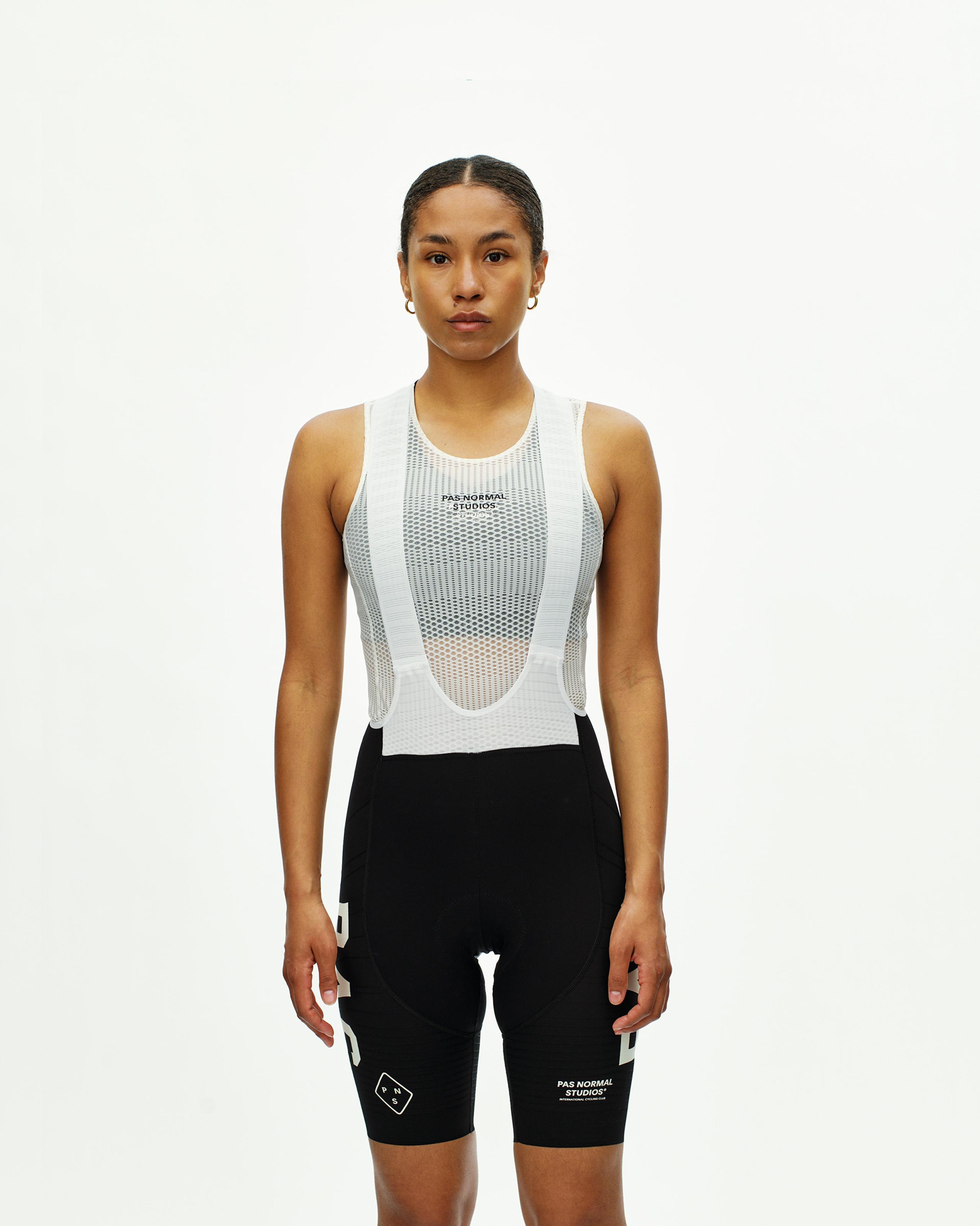 Black PAS Mechanism Pro bibs on model, front view with white mesh bib top