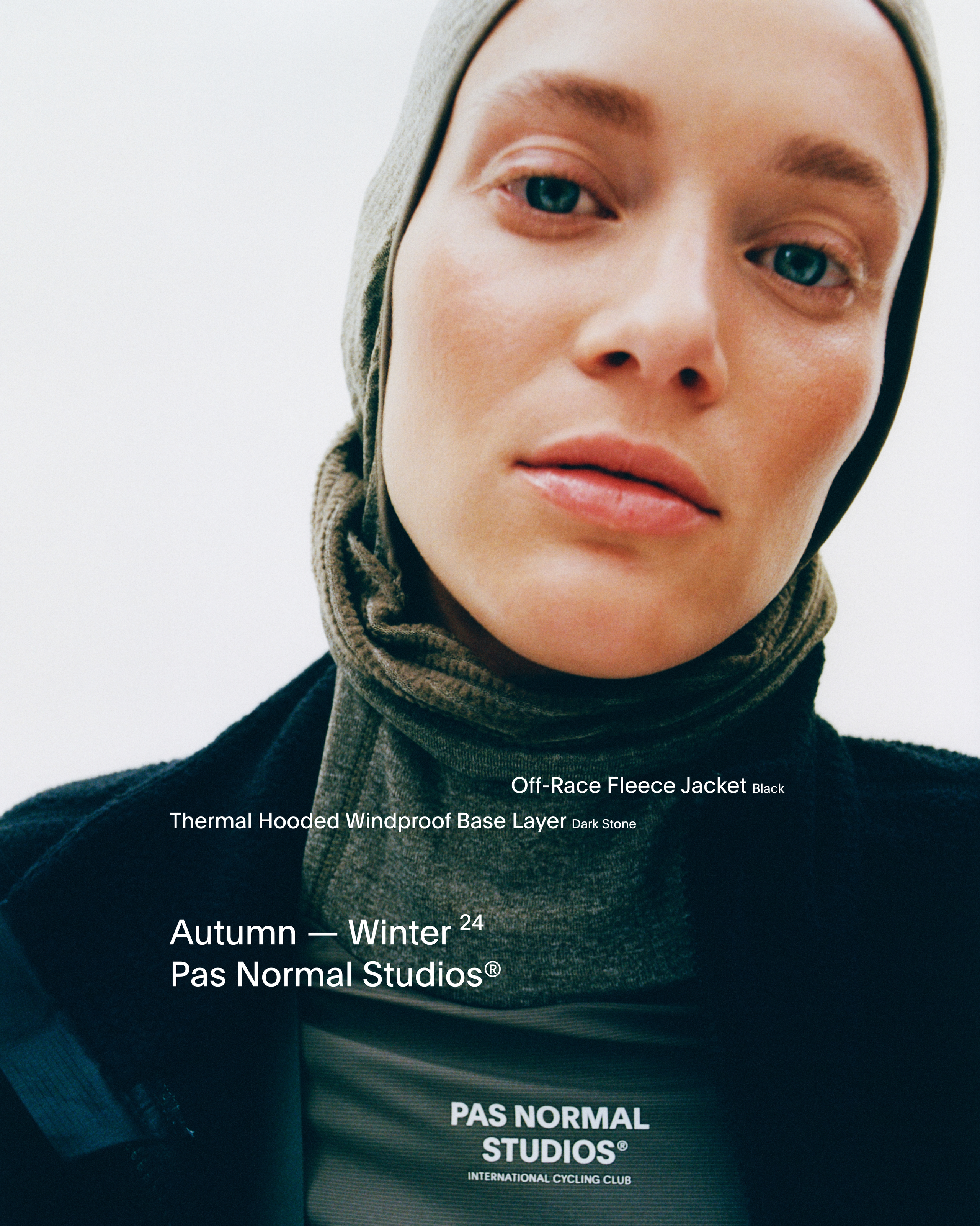 Model wearing black Off-Race Fleece Jacket with dark stone Thermal Hooded Windproof Base Layer underneath