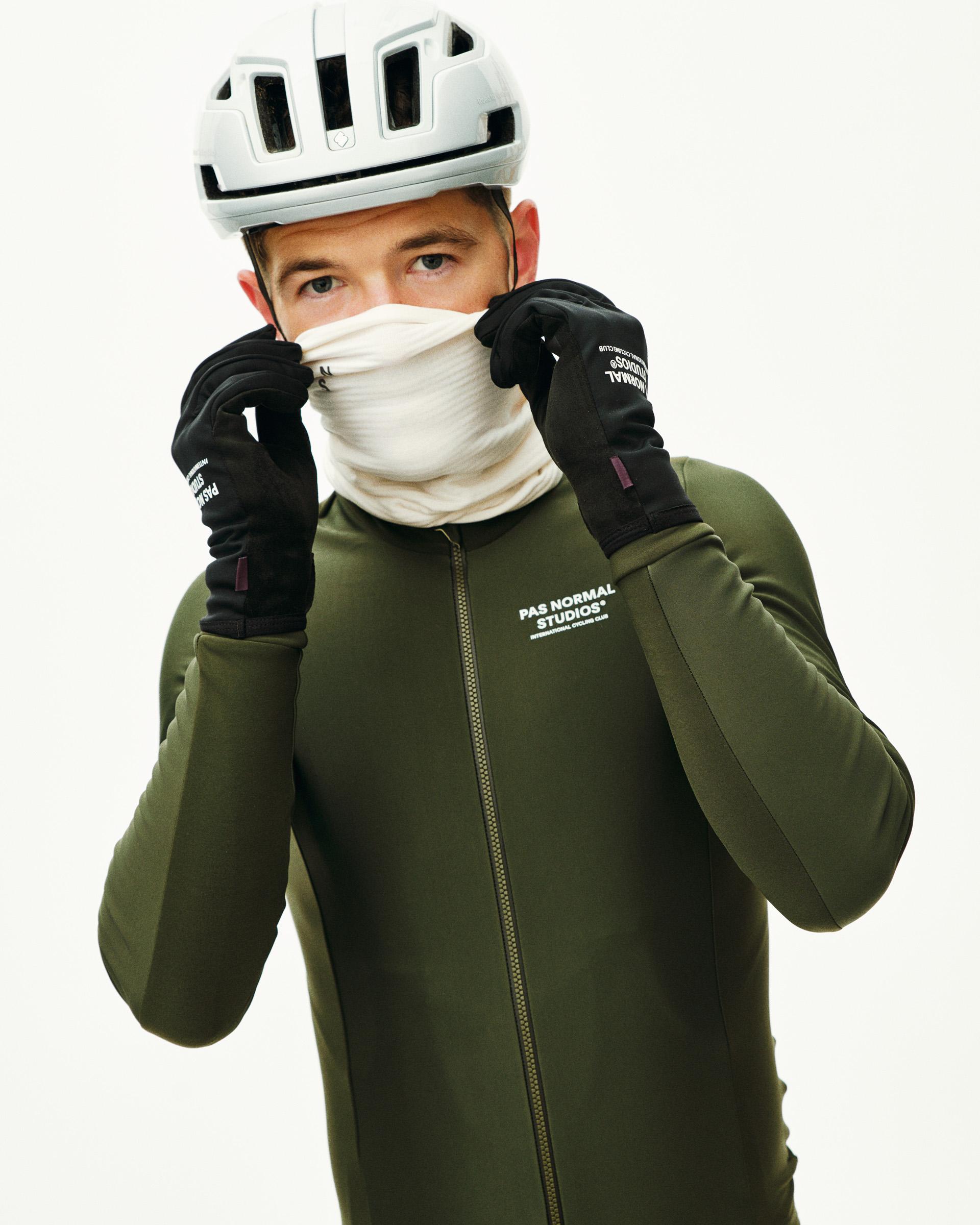 Off White Logo Thermal necktube on model with white helmet and olive jacket