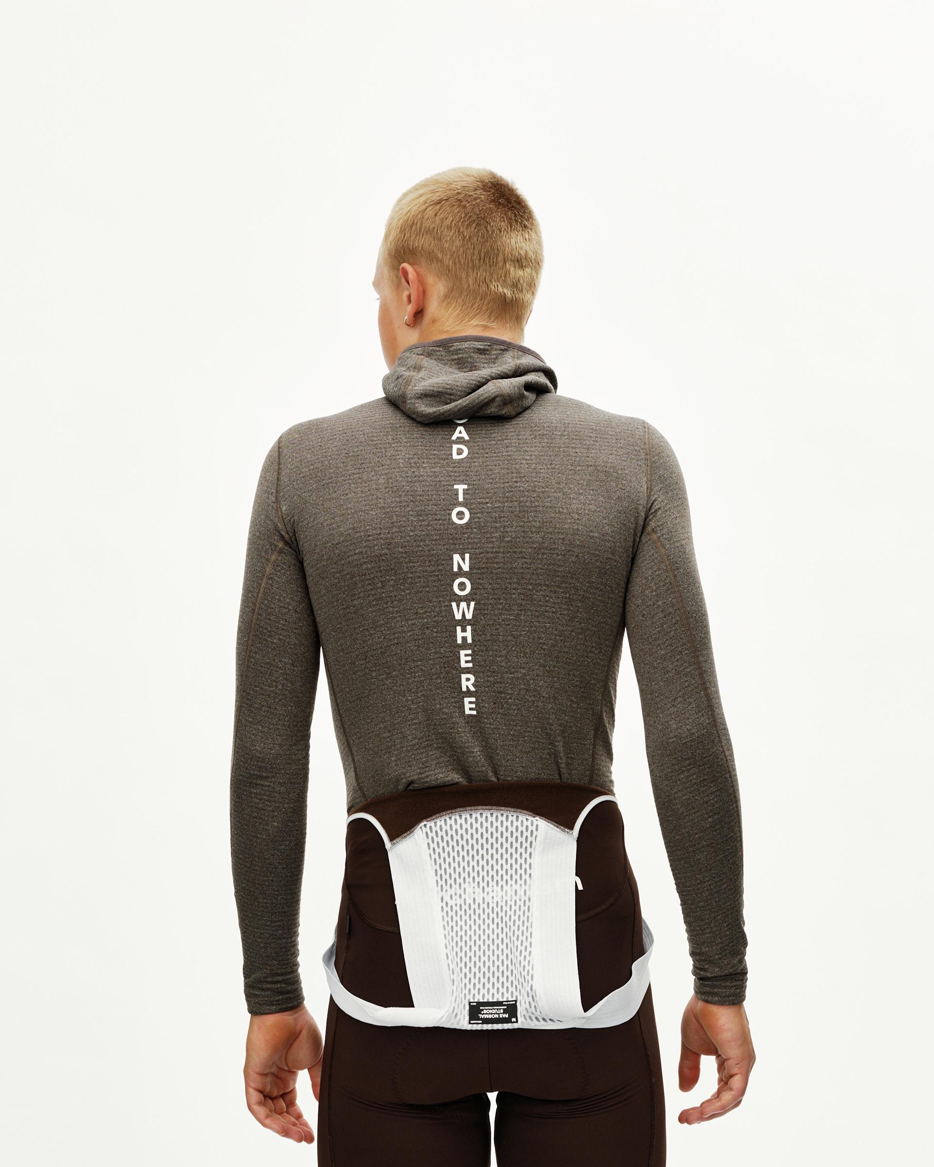 Dark Coffee brown Thermal Hooded Windproof cycling baselayer on model, rear view with vertical white back print