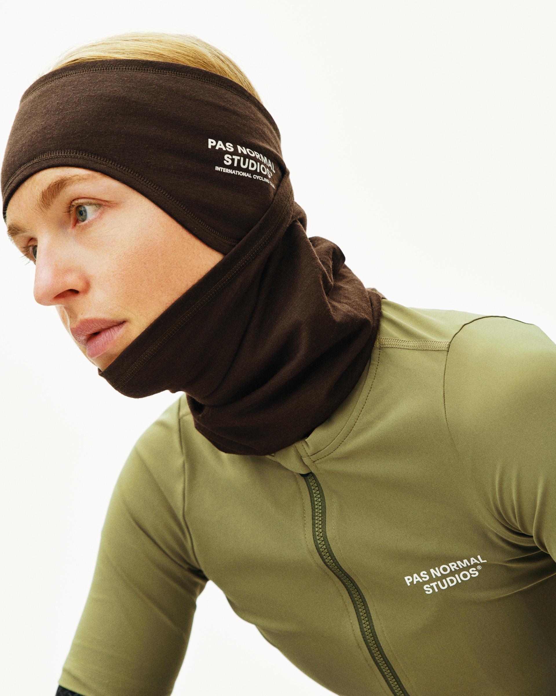 Brown Logo Merino headband on model with white logo print