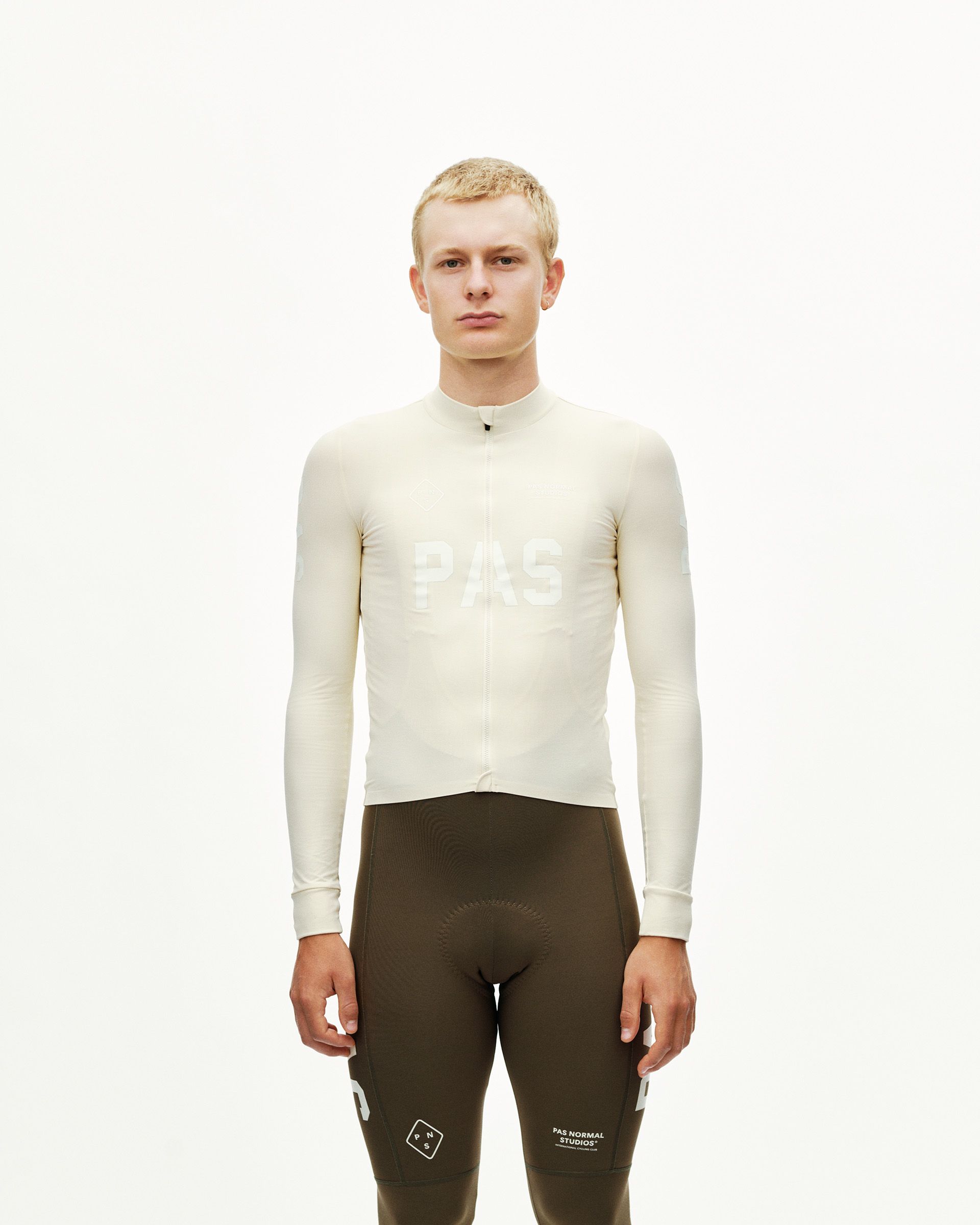 Sand PAS Mechanism long sleeve cycling jersey on model, front view with tone-on-tone chest print