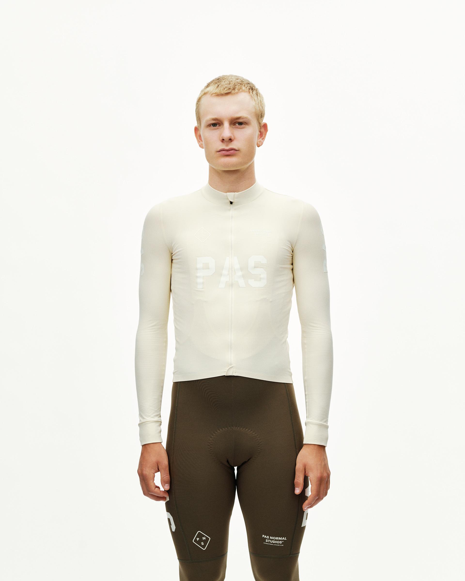Sand PAS Mechanism long sleeve cycling jersey on model, front view with tone-on-tone chest print