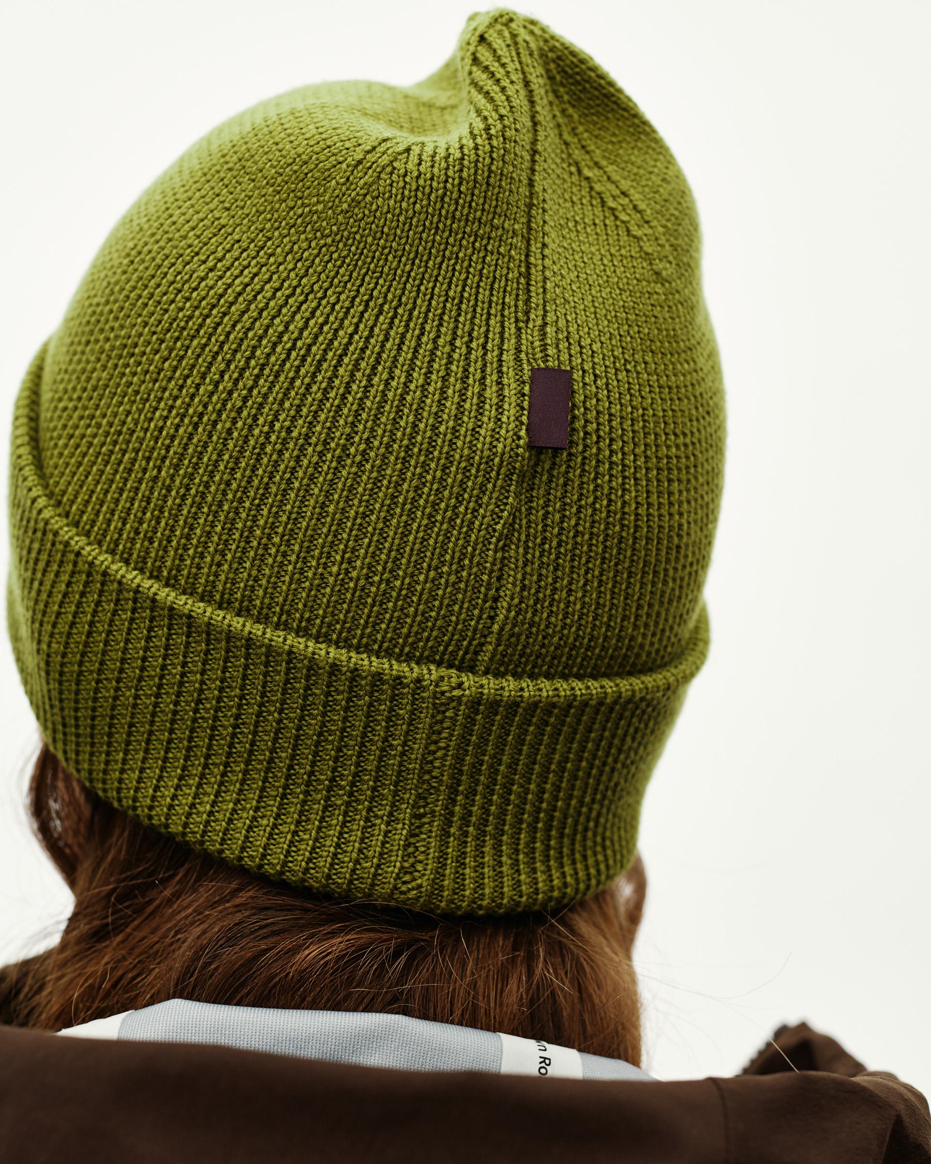 Dark Lime green Off-Race Wool Knit beanie on model, rear view with ribbed cuff and small leather label