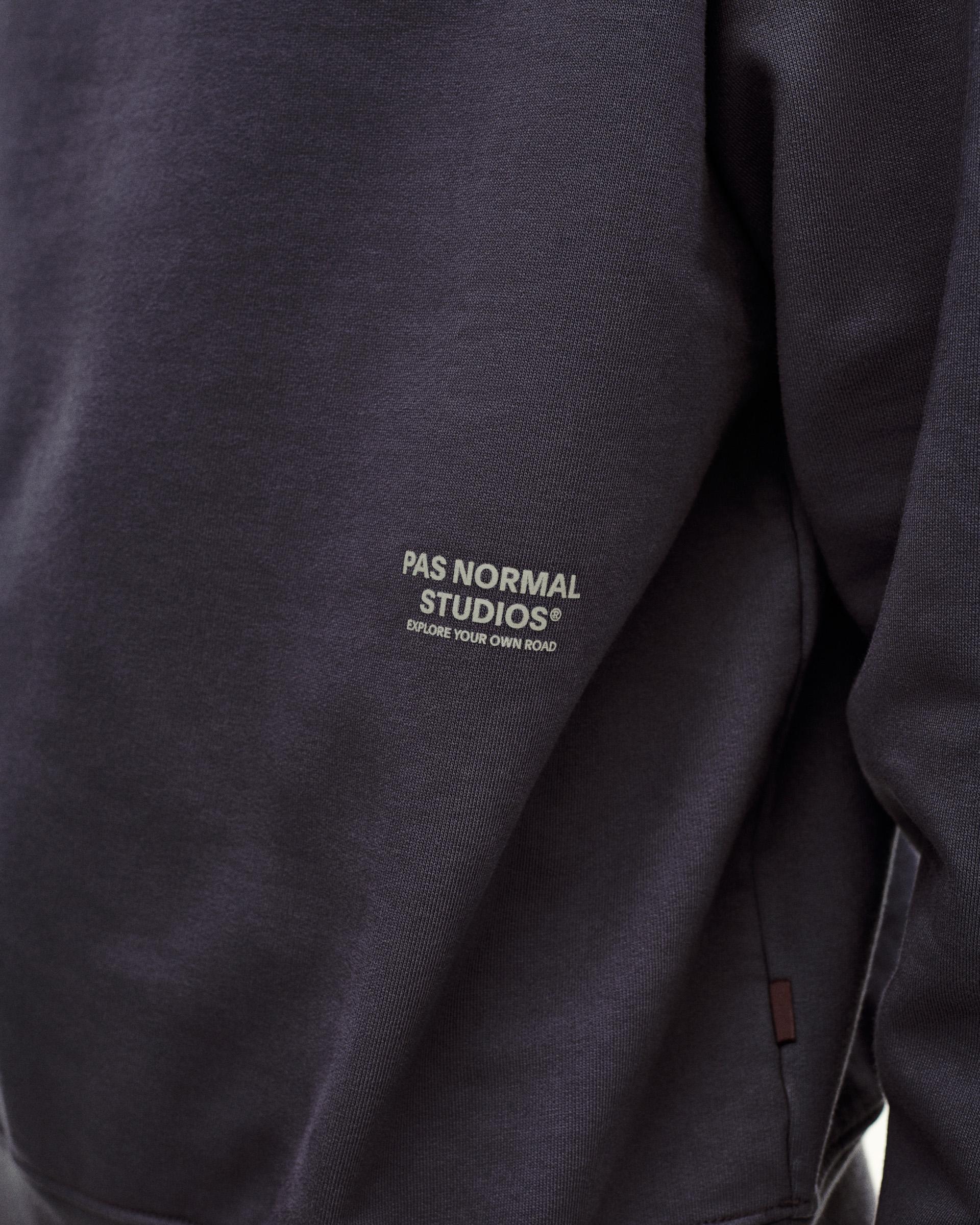 Grey Off-Race sweatshirt, detail view showing white chest logo and kangaroo pocket