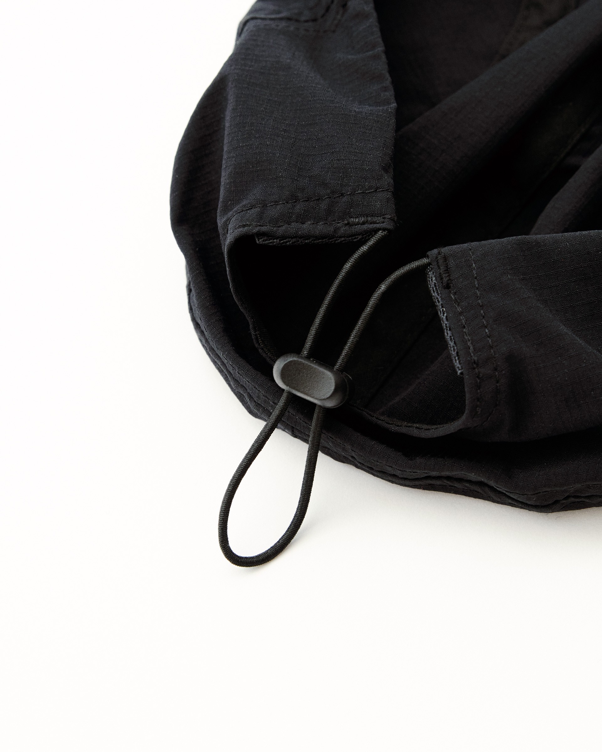 Hood with drawcord and cord lock toggle for adjustable fit
