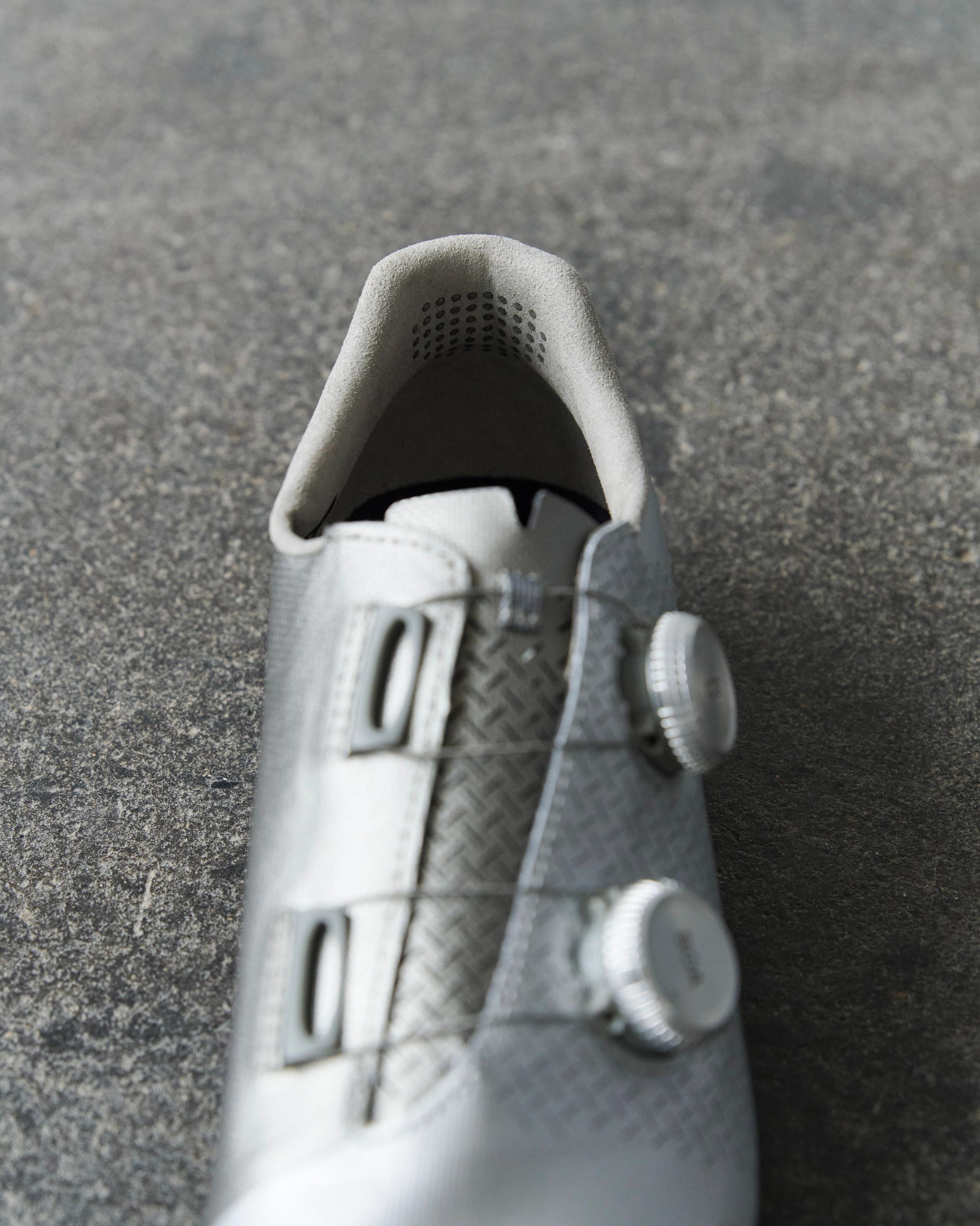 Silver Fizik Mechanism road shoe, detail view with dual BOA closure system