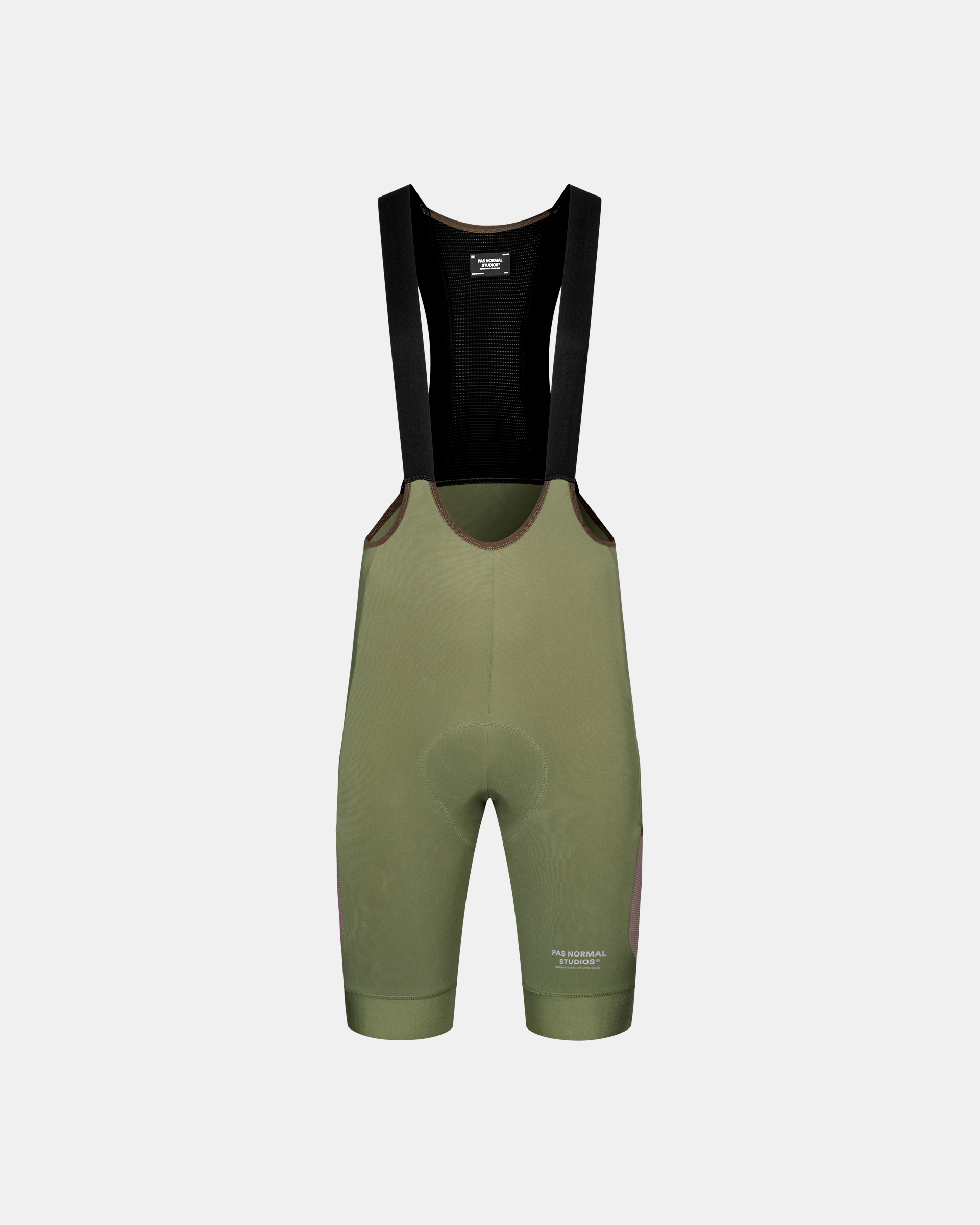 Light Olive Escapism Cargo cycling bibs, front flat lay with black mesh bib straps