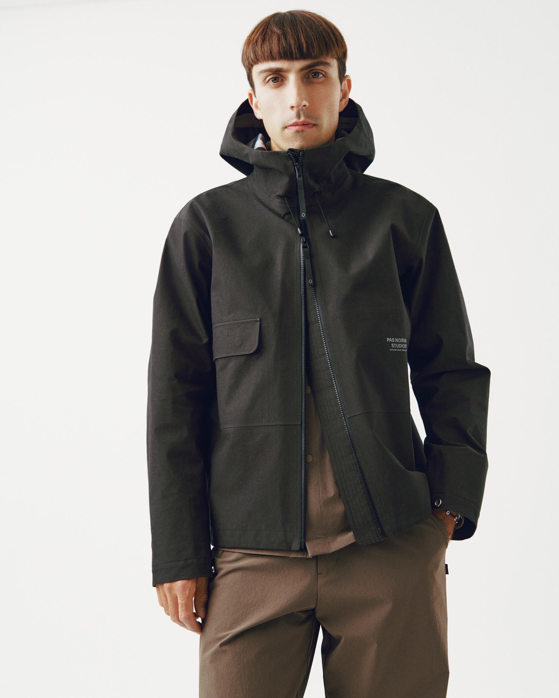 Dark Olive Off-Race 3L Cotton Shell jacket on model, front view with chest pocket and hood