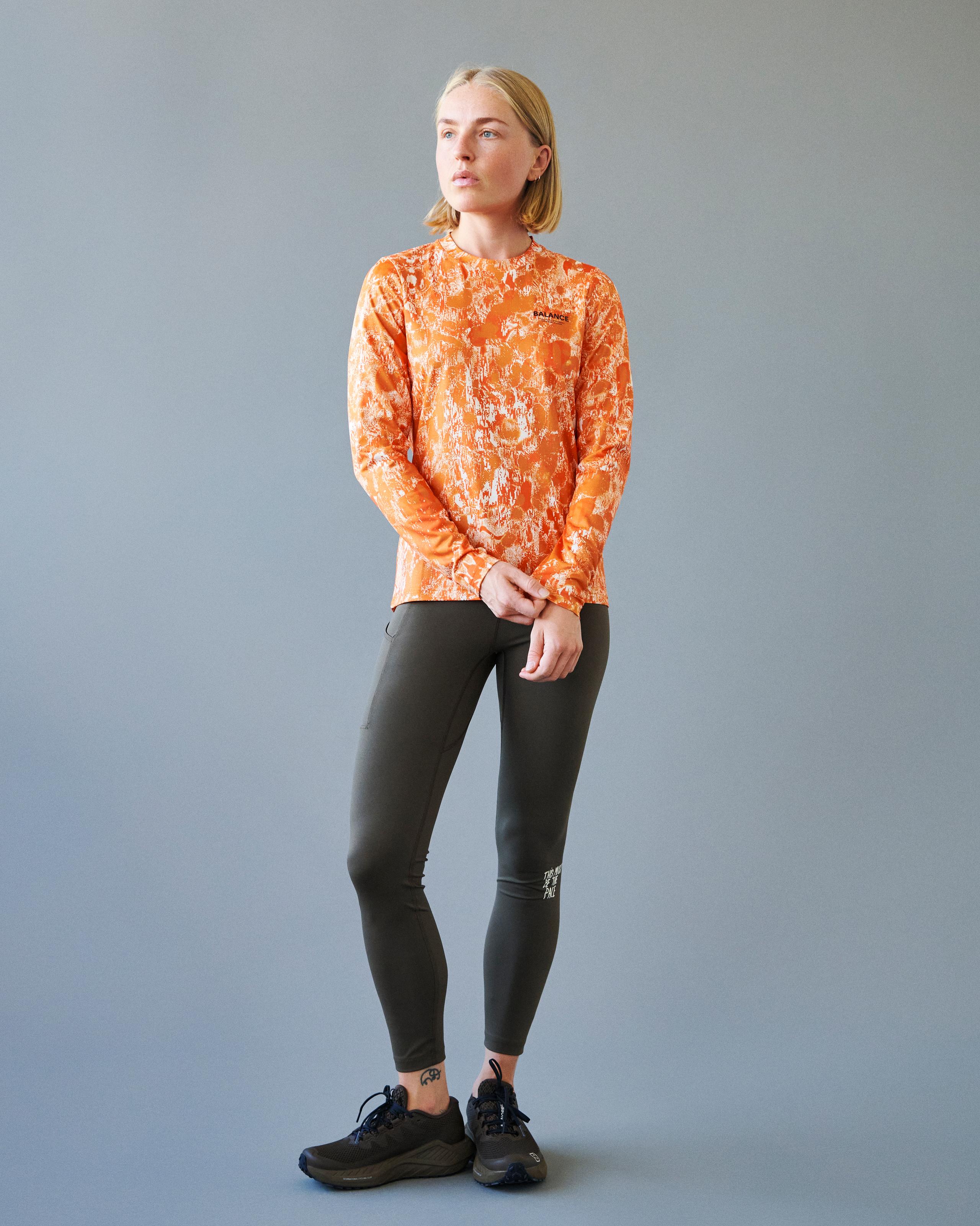Orange Balance long sleeve t-shirt on model with abstract print pattern