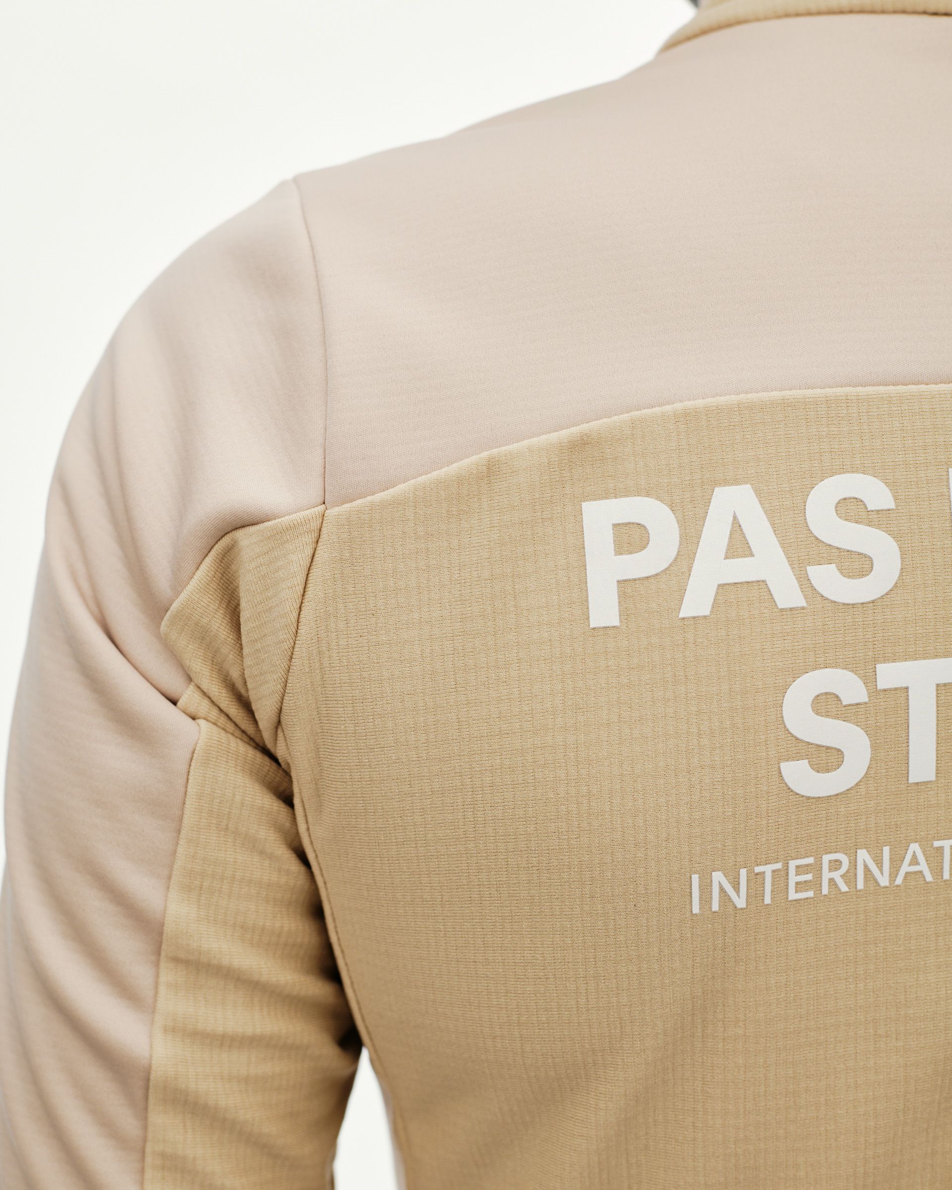 Linen Mechanism Thermal Long Sleeve cycling jersey on model, rear detail with two-tone panel and white back print
