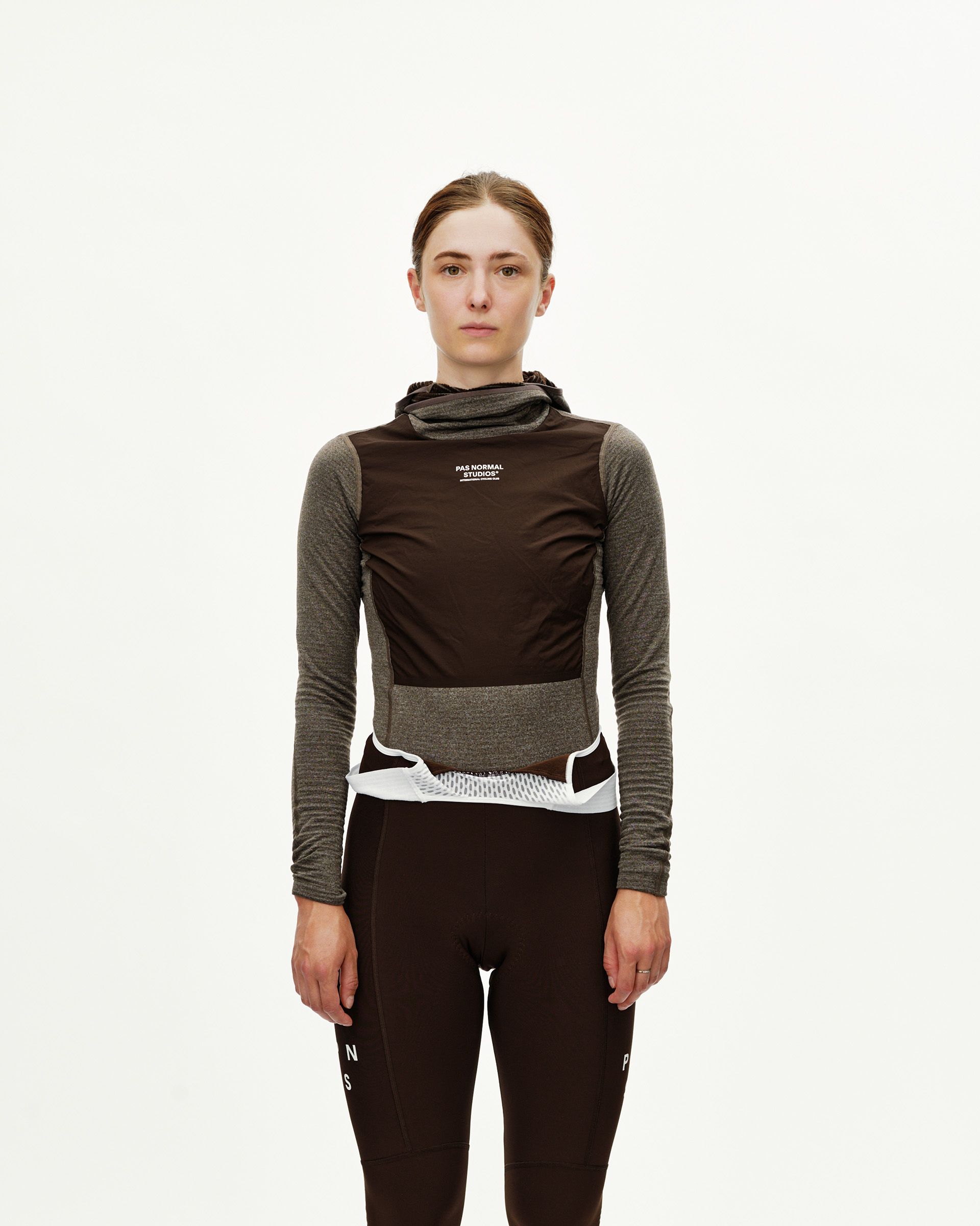 Dark Coffee brown women's Thermal Hooded Windproof cycling base layer, front view on model with white chest logo